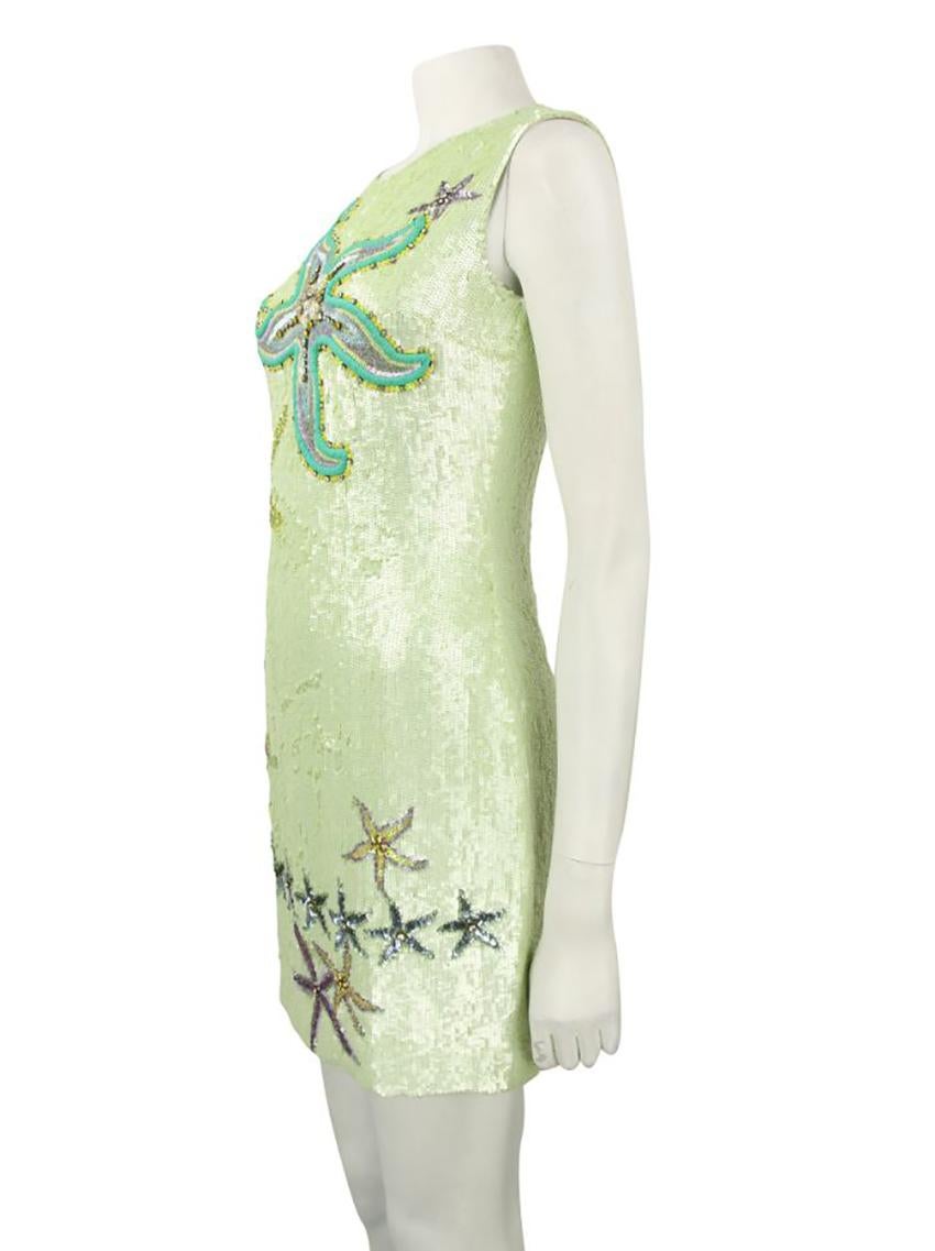 VERSACE

Original Versace Sequin Green Dress.
The model has tank tops, rounded neckline, beaded embroidered starfish throughout the piece and a back zipper closure.

Origin: Italy

Hardware Color: Gold

Size: IT 38  - US 2/4

Composition: 100% Silk;