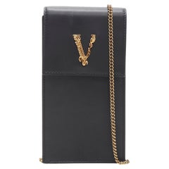 VERSACE Virtus V gold black top flap rectangular structured crossbody bag