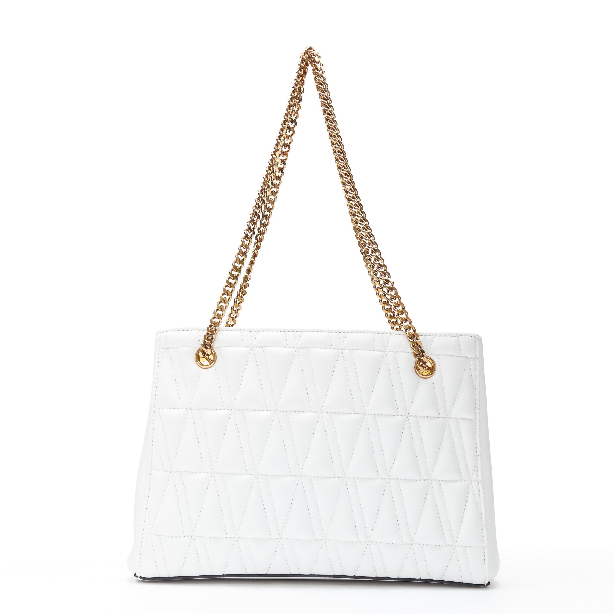 white quilted purse gold chain