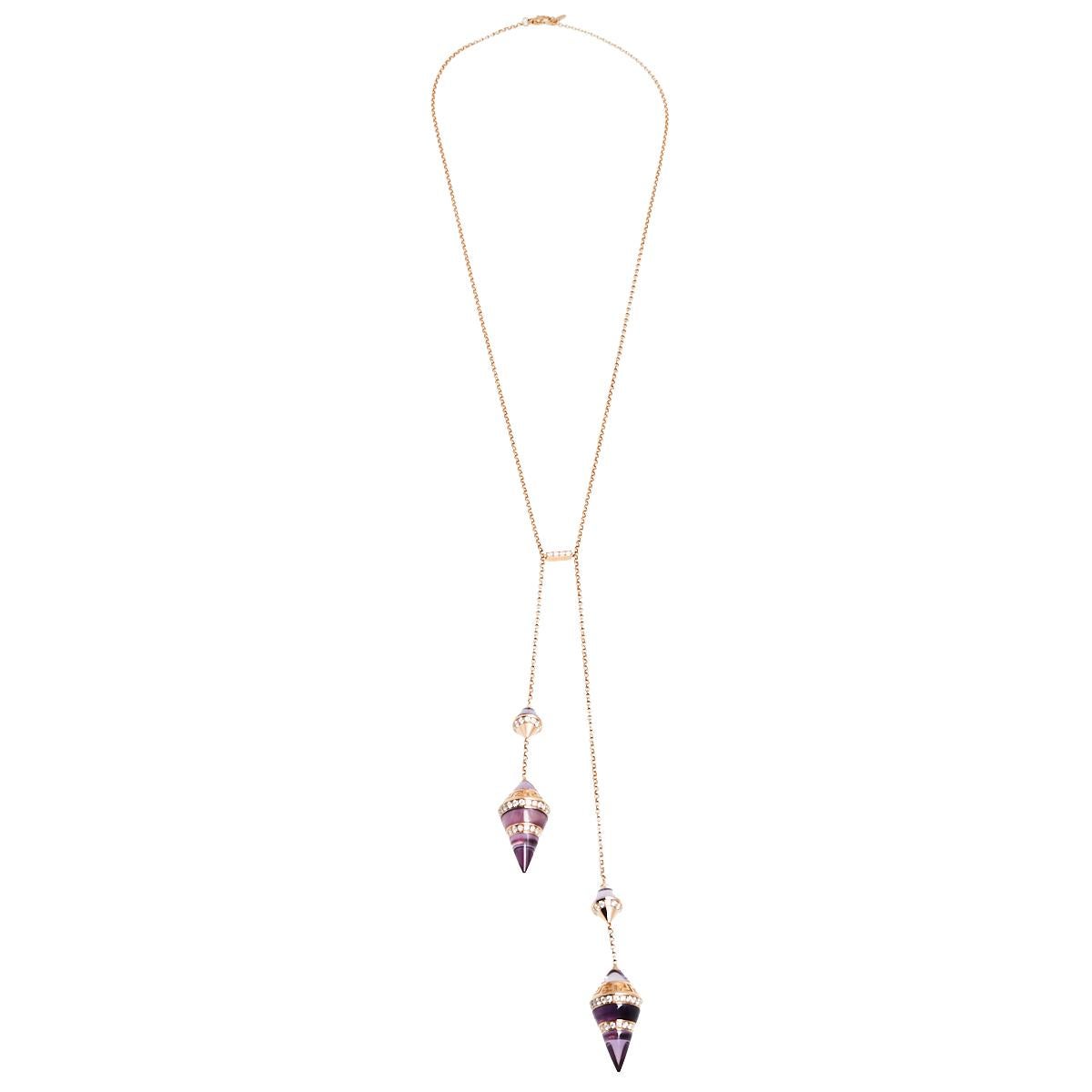 This Versace Sautoir necklace is a minimally splendid piece of jewelry that you'll find easy to pair, whether with a party/evening outfit or an effortless fall wedding edit. Made of 18k rose gold, the slim chain is designed to hold dangling charms