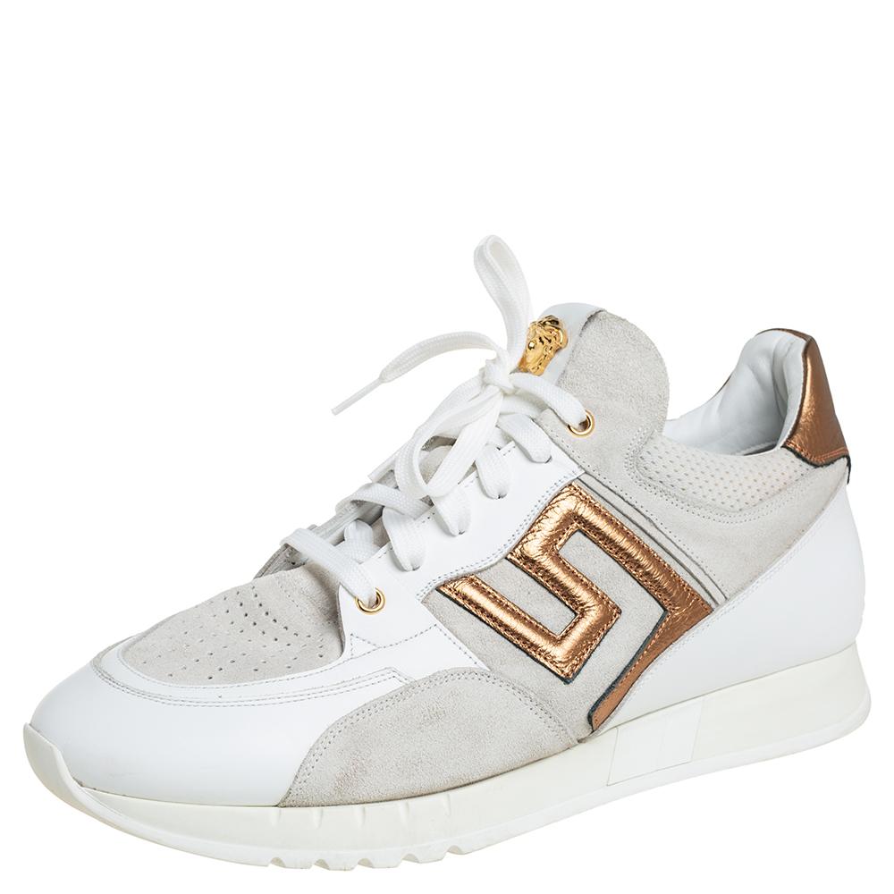 The Greek Key men's sneakers by Versace are designed in a low-top profile using suede and leather. Finished with lace-ups, durable soles, and the signature Greek Key element on the sides, this pair is high in comfort and style, just perfect to be