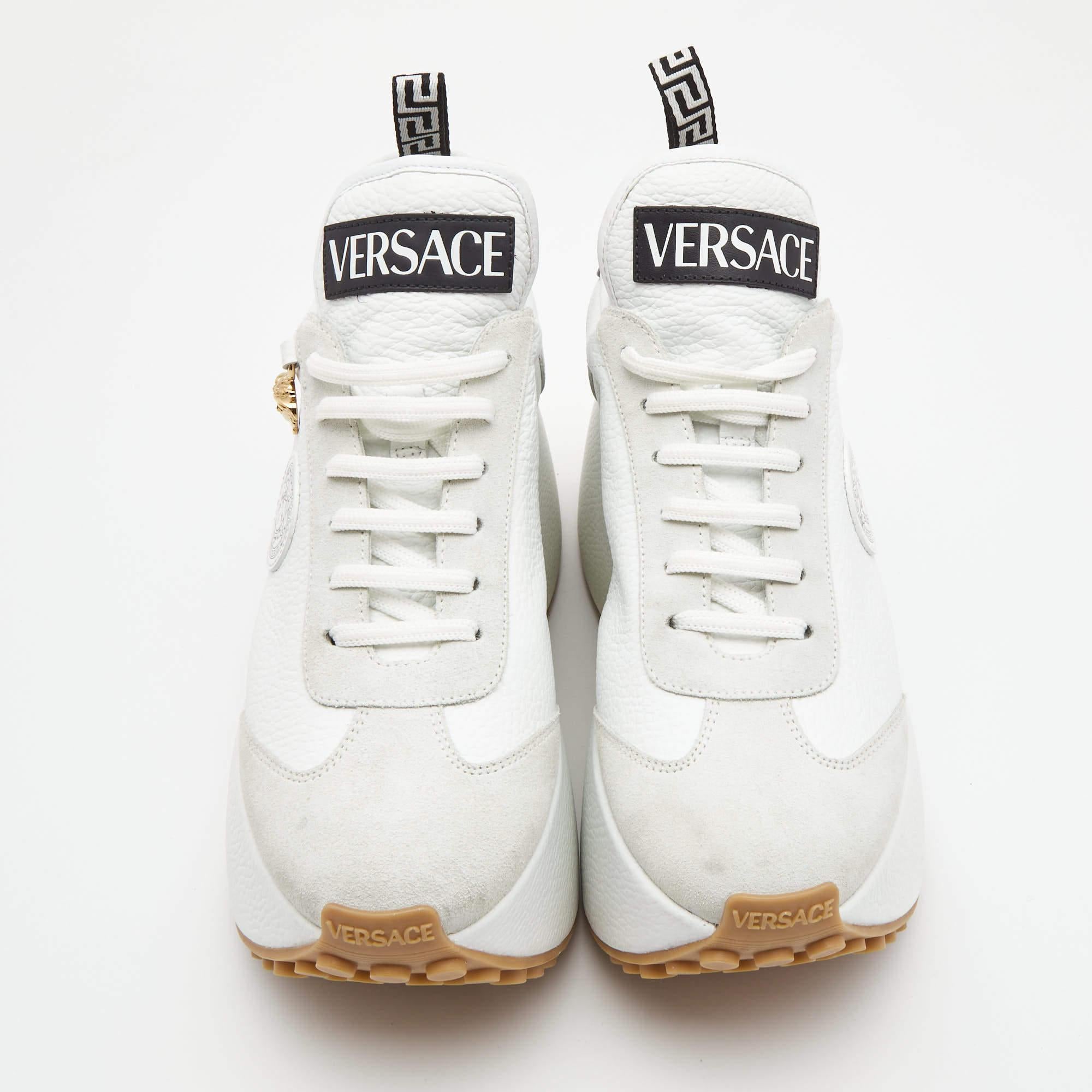Versace sneakers are a stylish footwear choice that combines luxury and comfort. Made with premium materials, these sneakers feature a raised platform sole for added height and a bold statement. The iconic Versace logo is often displayed