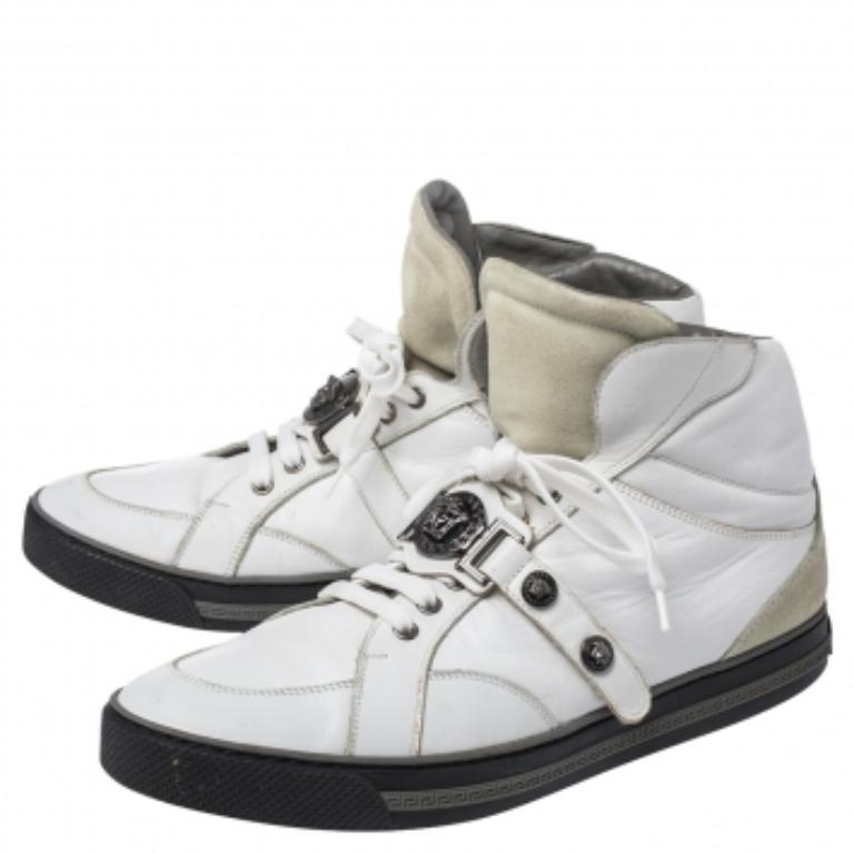 Brimming with fabulous details, these Versace sneakers are crafted from leather into a high-top silhouette and feature lace-up vamps, gunmetal-tone studs, and the iconic Medusa logo. Comfortable soles and trendy appeal make these sneakers a must-buy.