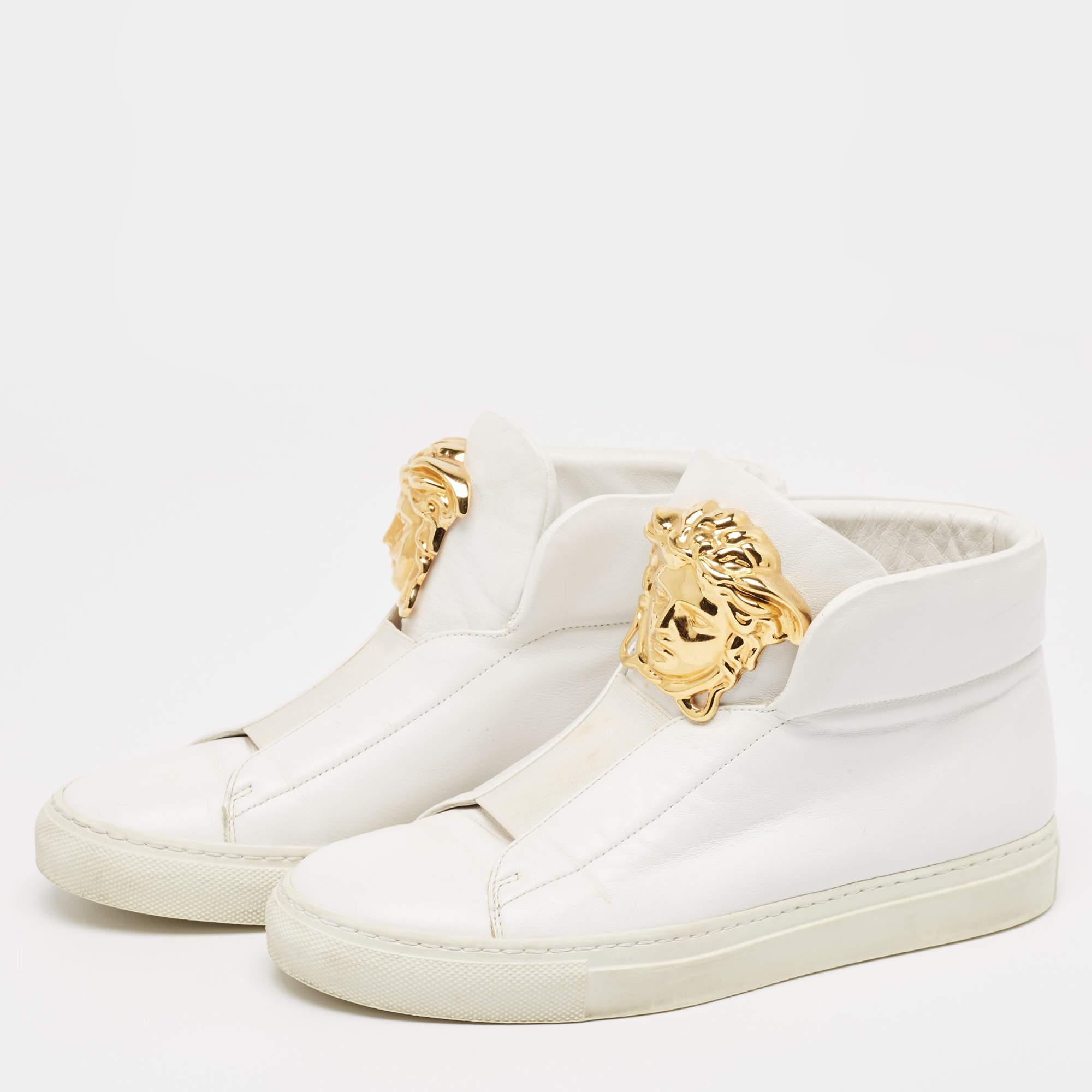 Coming in a classic silhouette these designer sneakers are a seamless combination of luxury comfort and style. These sneakers are finished with signature details and comfortable insoles.