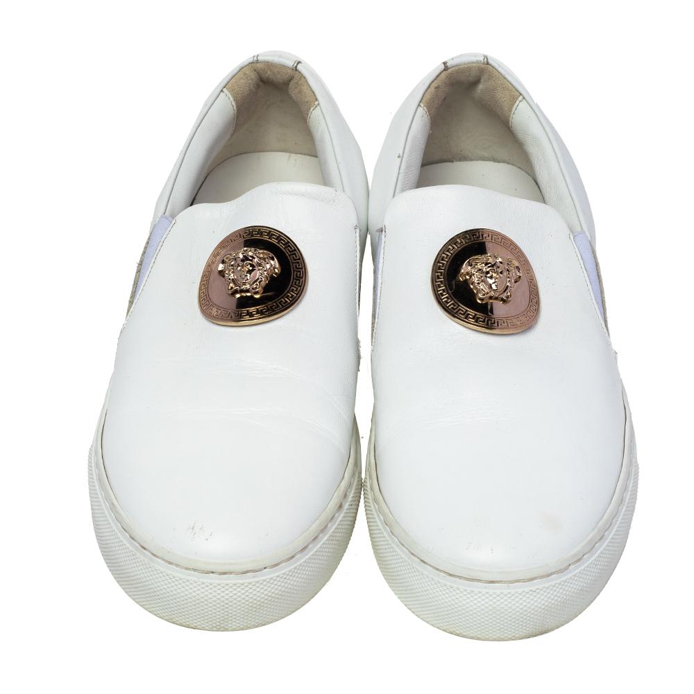 Sneakers are sought-after for reasons like comfort, ease and casual style. These Versace ones fit right in as they are stylish and snug. They come crafted from white leather into a design of elastic panels and the Medusa logo on the front. They are