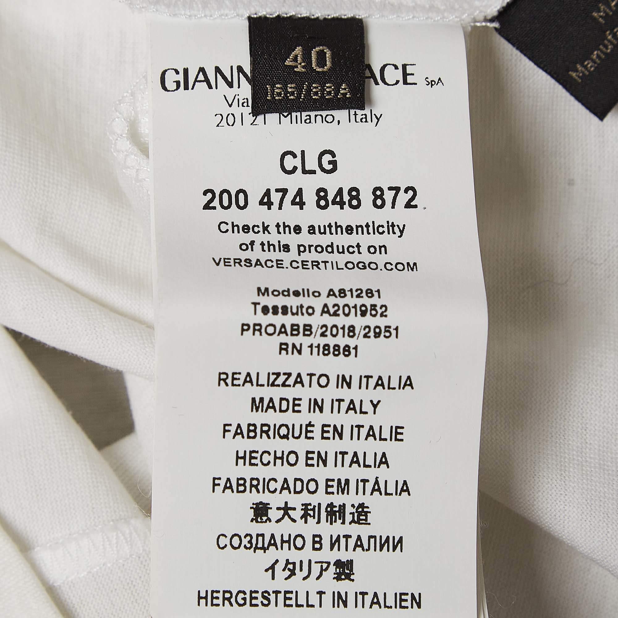 De las mujeres Camiseta de algodón con logotipo blanco Versace S en venta