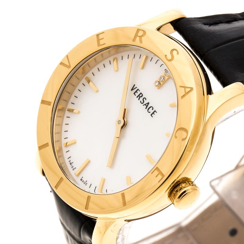 Awaiting to be yours is this stunner of a watch from Versace! Crafted with beauty using gold-plated steel, the Quartz watch is held by leather straps. It brings a white Mother of Pearl dial with index hour markers and signature engravings on the