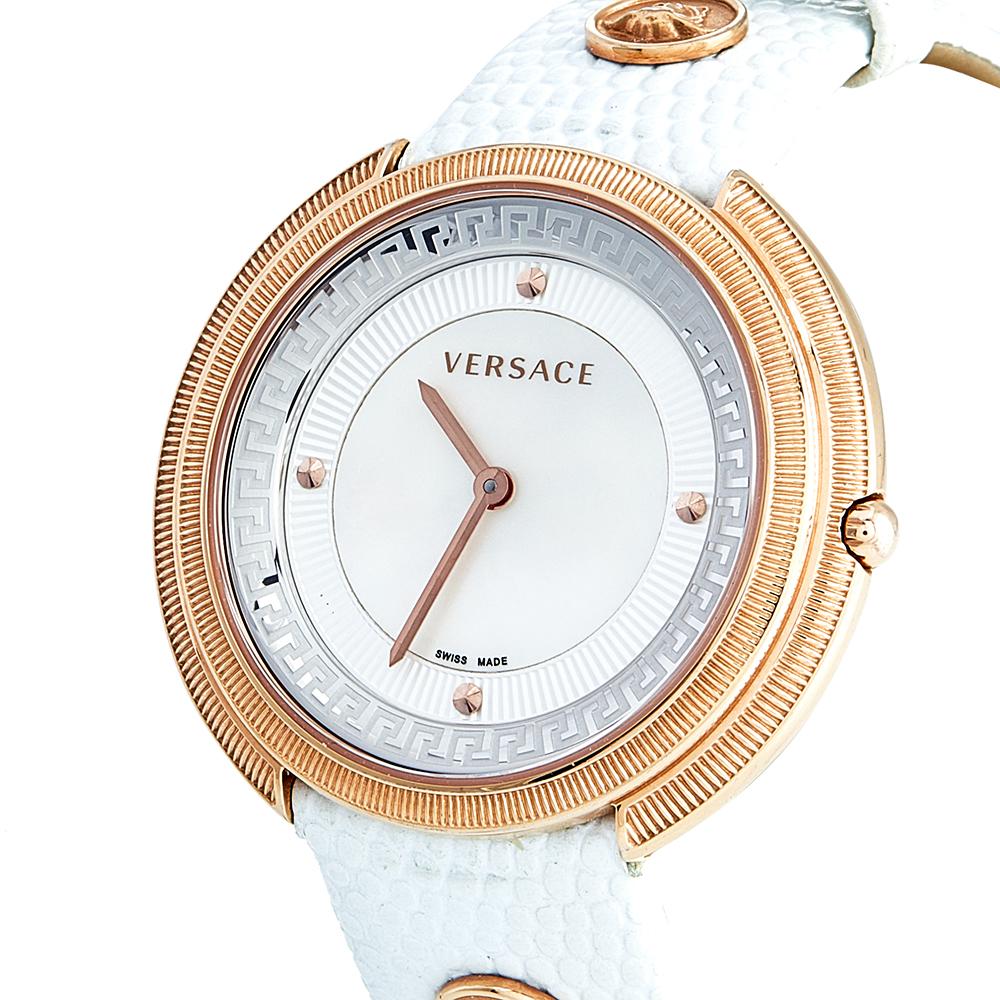Simplicity and elegance find their way into a perfect combination with style and glamour to complete this stunning watch by Versace. Crafted out of gold-plated stainless steel and held by a leather bracelet, this quartz watch features quarter stud
