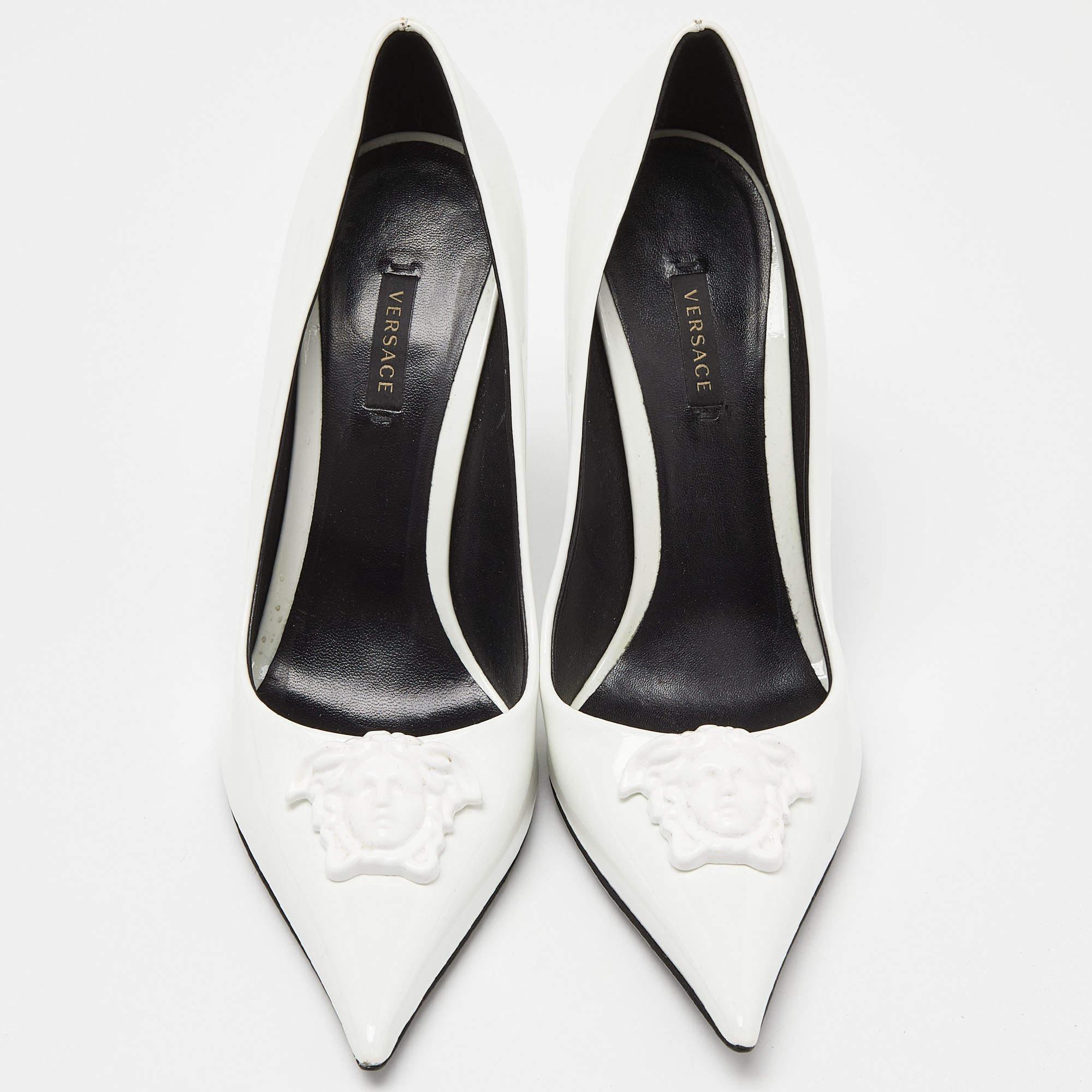 Make a chic style statement with these Versace white pumps. They showcase sturdy heels and durable soles, perfect for your fashionable outings!

