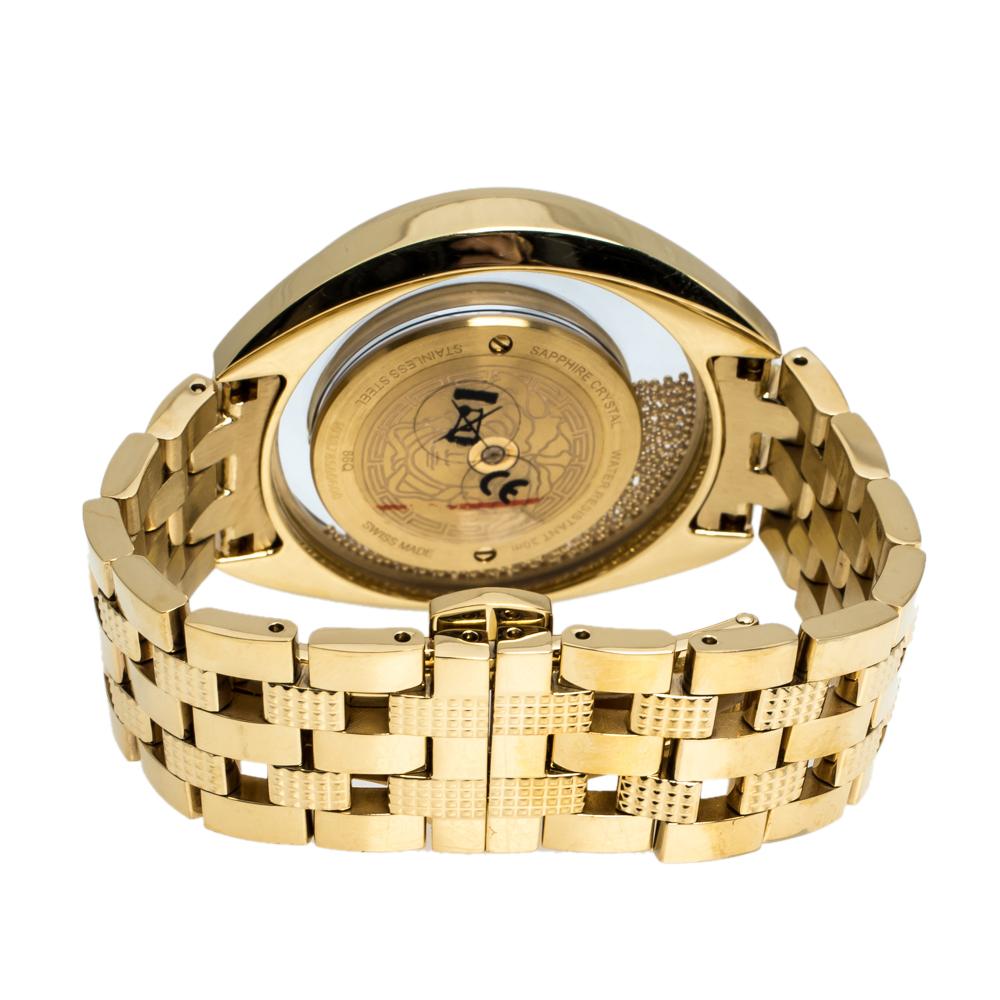 This beautiful timepiece from the house of Versace is sure to be a conversation starter with its eclectic and eye-catching design. Constructed in gold-plated stainless steel, this Destiny Spirit 86Q watch features a transparent panel on the case