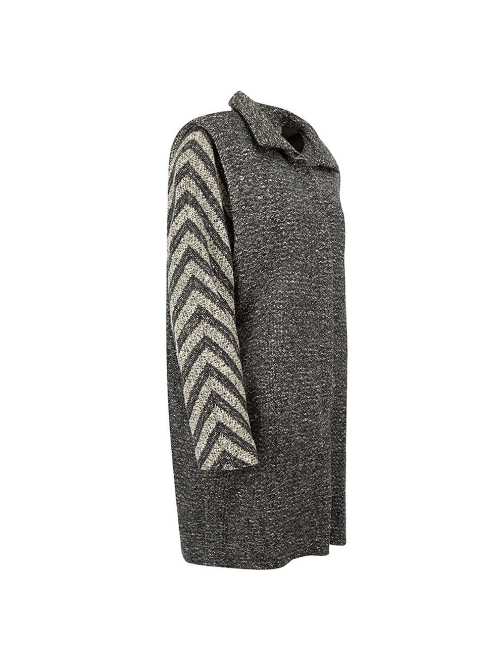 CONDITION is Good. General wear to coat is evident. Moderate signs of wear to the lining with tears at the underarms on this used Versace designer resale item. 



Details


Grey

Wool

Long coat

Single breasted

Chevron striped sleeves

Front side