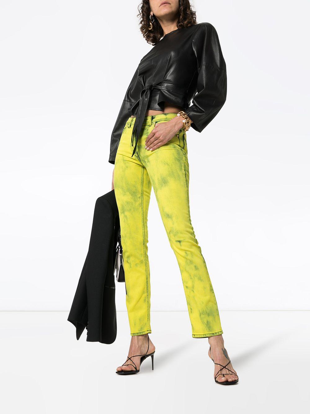 Versace Yellow Acid Wash Denim Skinny Jeans with Logo Label

These Versace acid yellow Versace acid wash logo label skinny jeans are expertly crafted in Italy from stretch denim, showcasing the standard trouser fly and button fastening with belt
