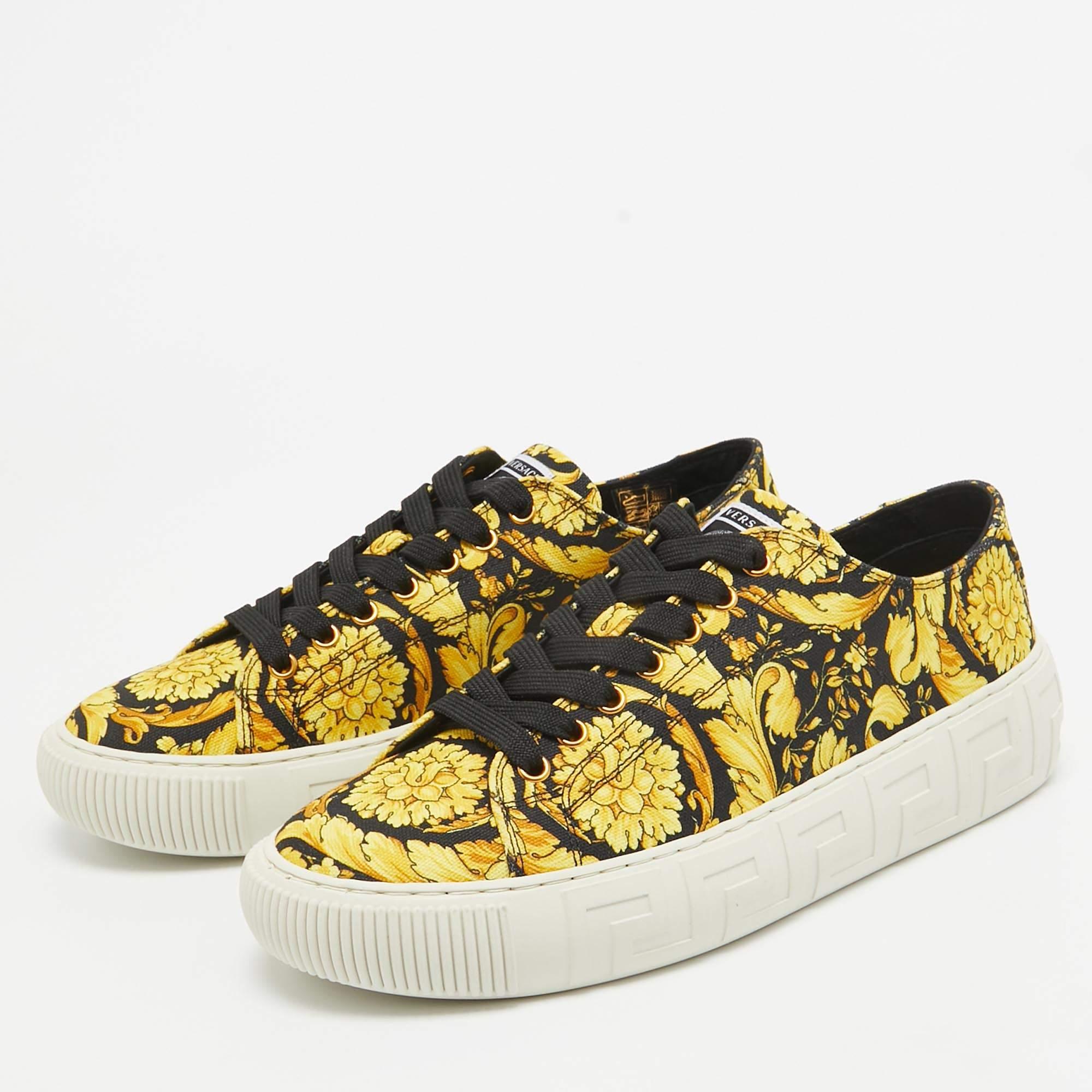Designed to elevate your style quotient and give you comfort at the same time, Versace brings you these lovely sneakers. They've been crafted from canvas and designed with Barocco prints, lace ties, and rubber soles.