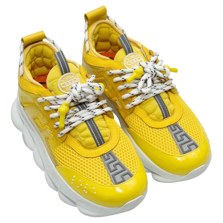 Versace Yellow and White x Chain Reaction Chunky Sneakers at | sneakers, versace yellow shoes, yellow versace shoes