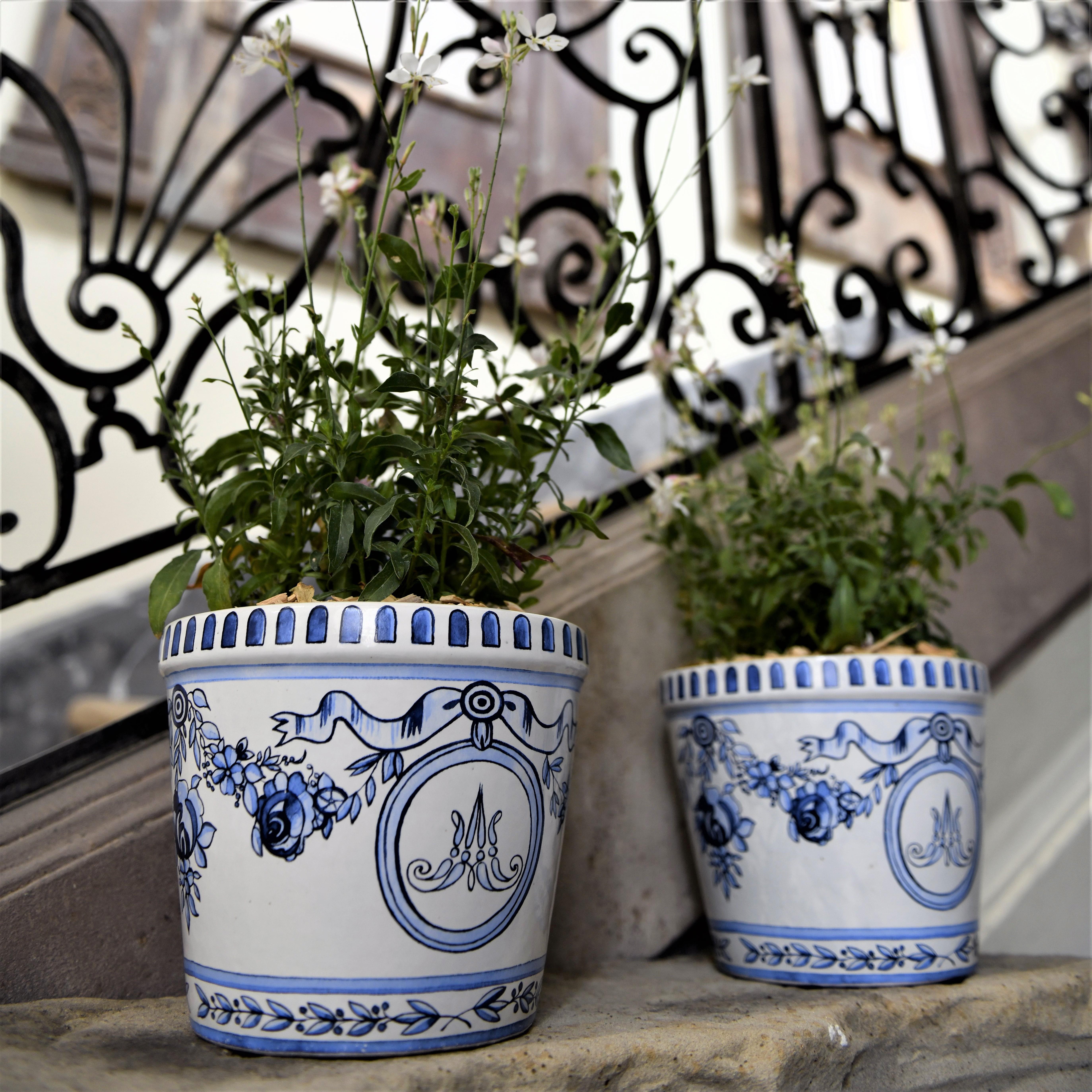 Handmade reproduction of the original 18th century Marie-Antoinette flower pots with saucers in blue and white enameled, frost-proof stoneware. Originally created for the Versailles castle gardens. Packed in a box with the Queen's