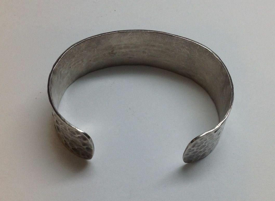 VERSANI hammered texture sterling silver cuff bracelet.

Marked: VERSANI .925

Measures: 7