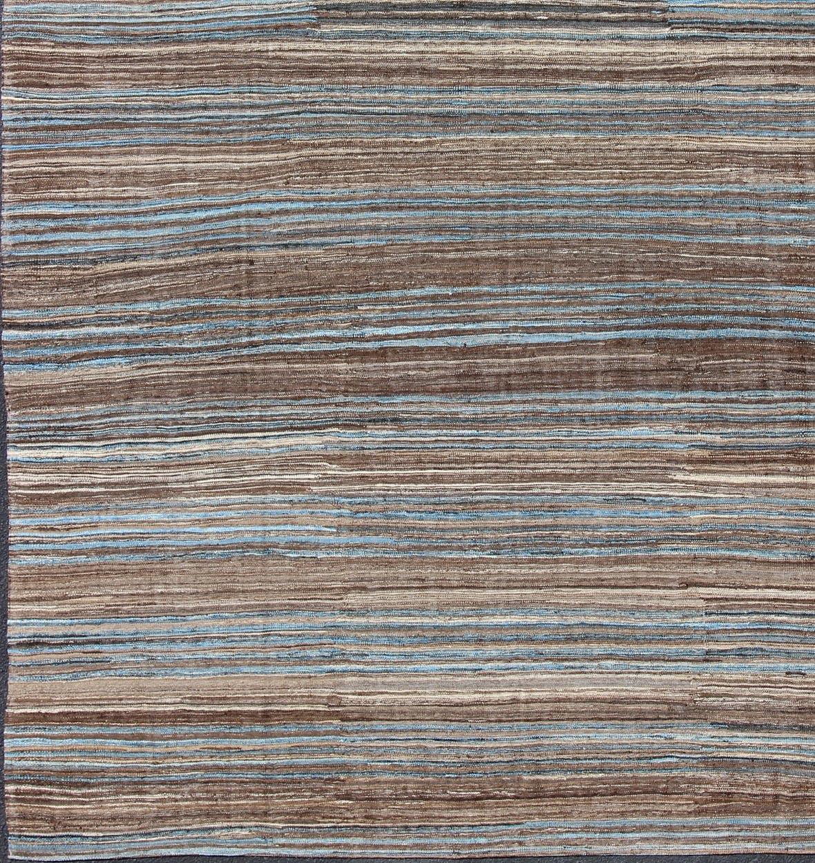 Versatile flat-weave Kilim for a Modern interiors as well as casual interiors or any Classic design
Flat-weave Kilim rug, Keivan Woven Arts / rug afg-27812, country of origin / type: Afghanistan / Kilim

This beautiful blue and brown composition