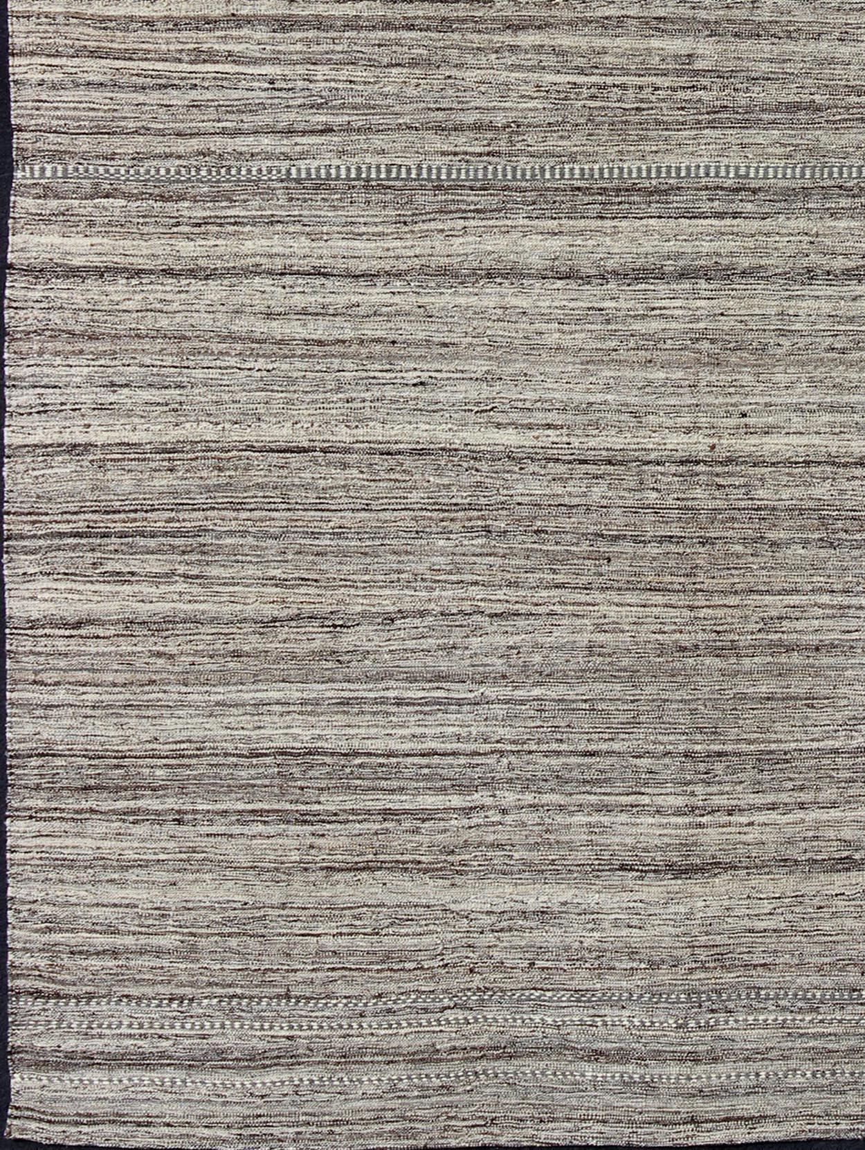 Versatile and natural color-tone flat-weave Kilim for a Modern or Classic design
Flat-weave Kilim rug with natural tones, rug afg-21361, country of origin / type: Afghanistan / Kilim

This neutral colored piece features a design that evokes an easy