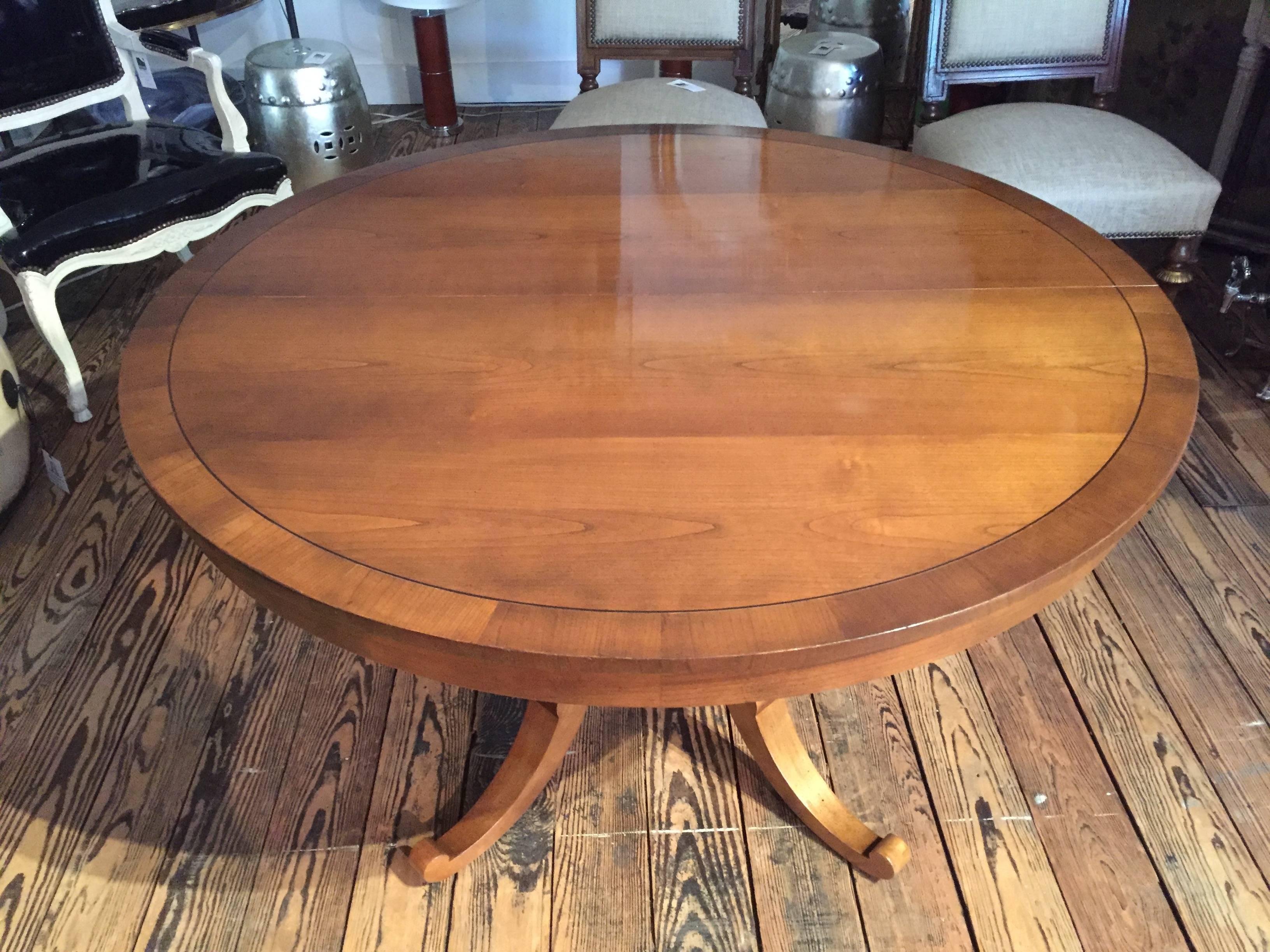 Versatile Round and Expandable Vey Long Oval Cherry Dining Table 1