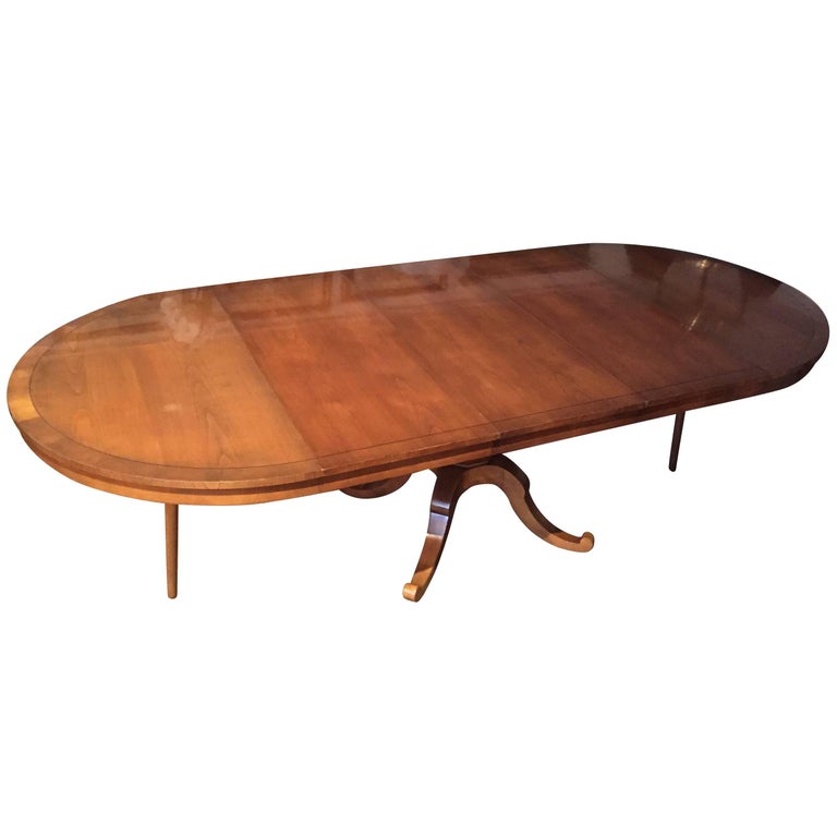 Versatile Round and Expandable Vey Long Oval Cherry Dining Table For