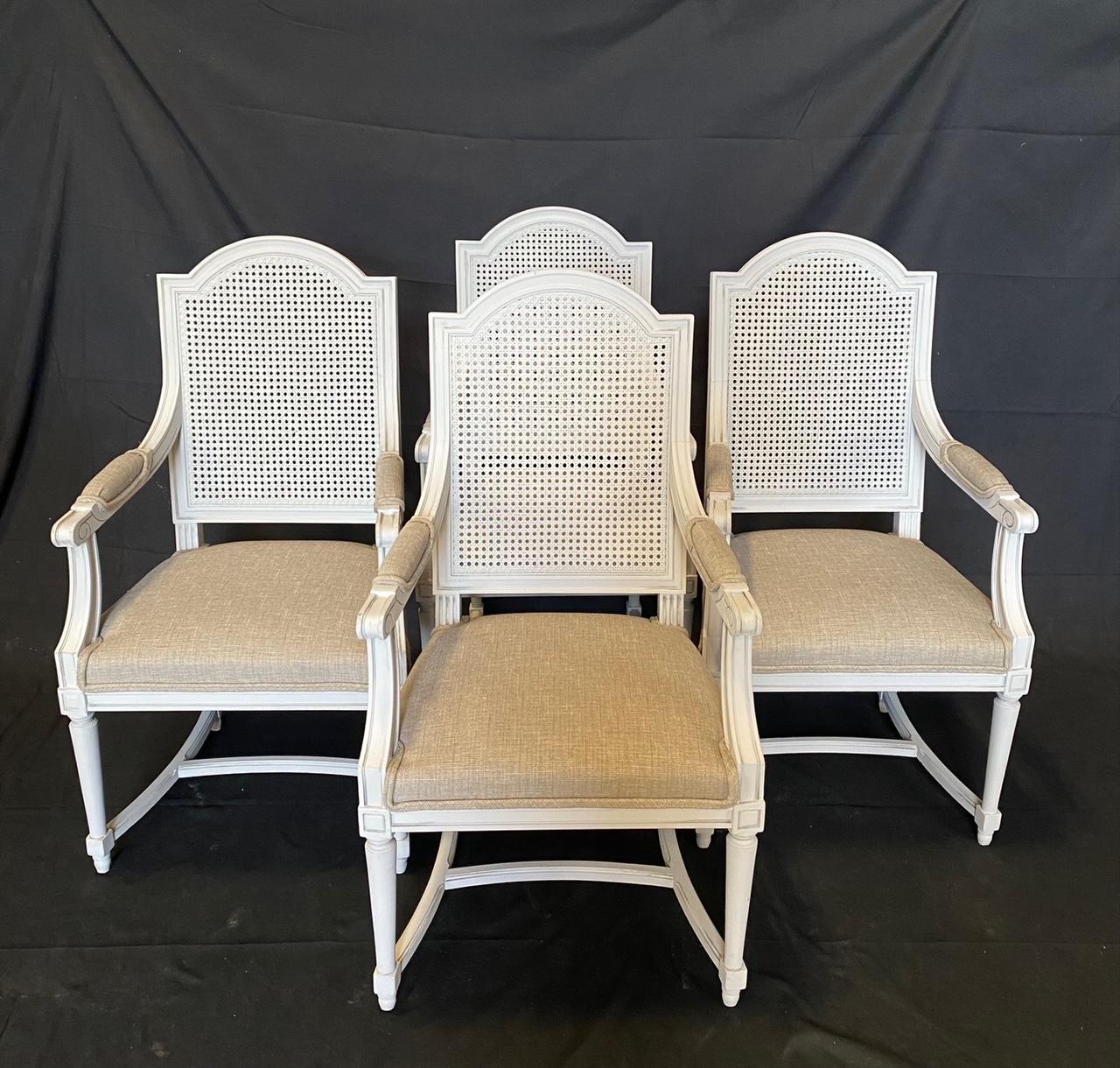 Really lovely Louis XVI armchairs bought in Lyon, France. Sturdy with pretty caning, all in great condition. We have 19 available. Contact us for larger sets at discounted prices! All with new neutral upholstery. #5759.

 