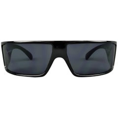 VERSUS by GIANNI VERSACE Mod. noir en acétate. Lunettes de soleil EW1