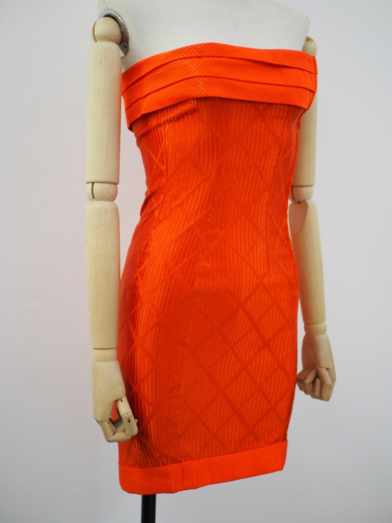 Versus by Gianni Versace orange dress
totally made in Italy in size 42