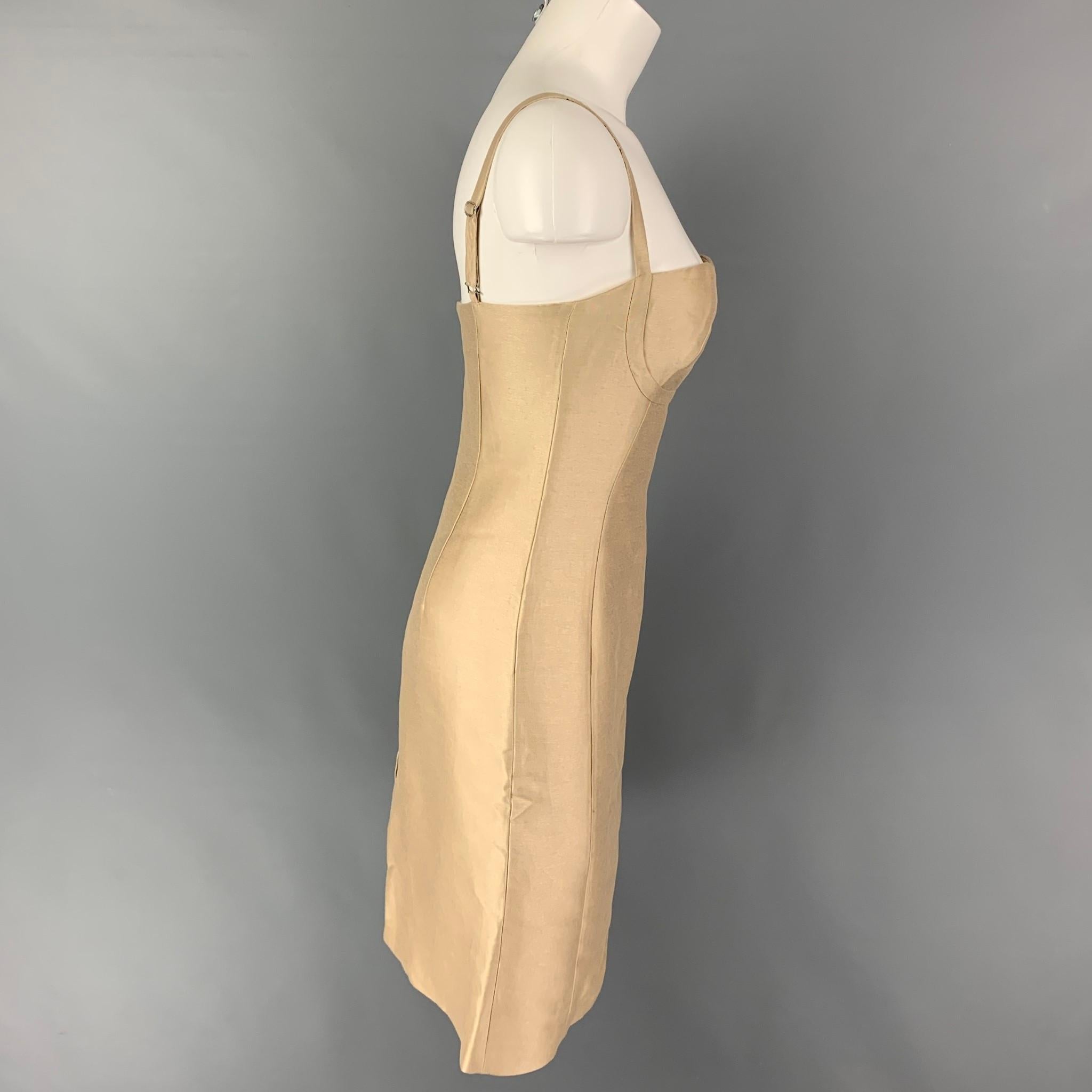 VERSUS by GIANNI VERSACE dress comes in a champagne cotton / silk featuring spaghetti straps, back slit, and a back zipper closure. Made in Italy. 

Very Good Pre-Owned Condition.
Marked: 26/40

Measurements:

Bust: 30 in.
Waist: 28 in.
Hip: 34