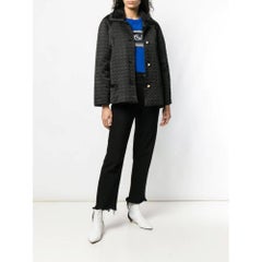 Versus by Gianni Versace Vintage 90s black geometric quilt jacket.