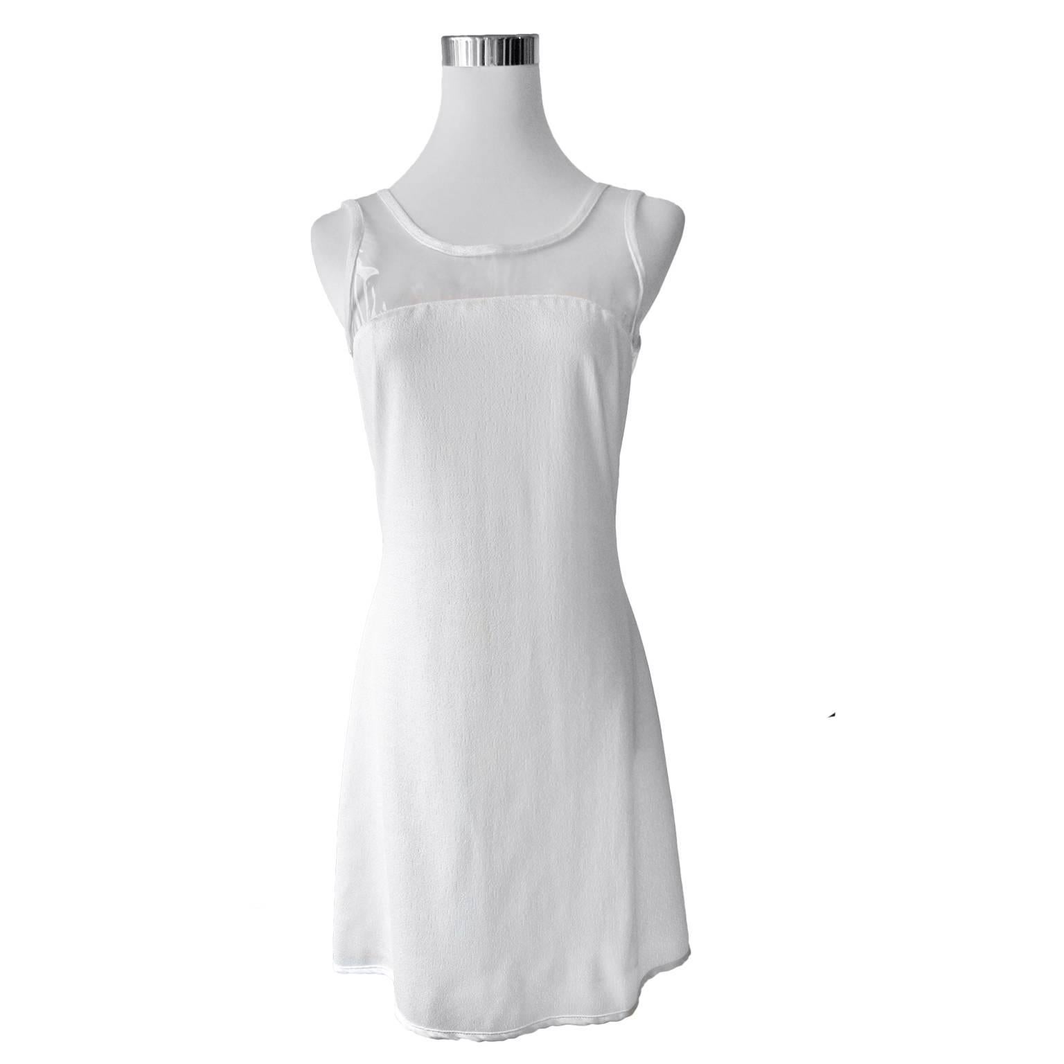 Versus Gianni Versace white dress from 90s. Clear vinyl front / back shoulder detail with piping.
Size : 42 (IT), 6 (US) 
Shoulder to hem length : 83 cm 
