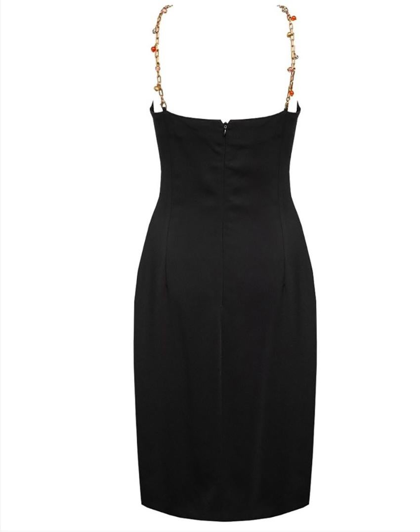 VERSACE VERSUS




This dress has accented with a decorative gold- tone chain
 


Content: 97% viscose, 13% elastane
lining: 57 % viscose,40% polyamide, 3% elastane


IT Size: 42 - US 6

Made in Italy

Pre-owned, excellent condition!

Comes with