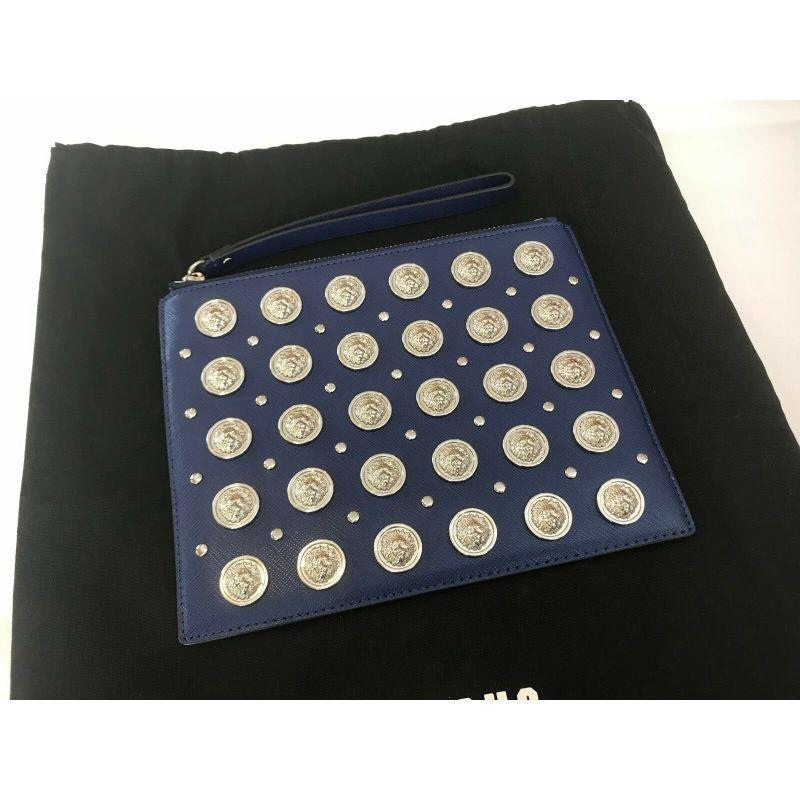Versus Versace Blue All Over Silver Logo Embellishments Clutch Leather M Bag

Additional Information:
Material: 100% Leather and metal
Color: Multicolor
Style: Clutch
Dimension: 8 W x 0.6 D x 6.5 H in
100% Authentic!!!
Condition: Brand new with