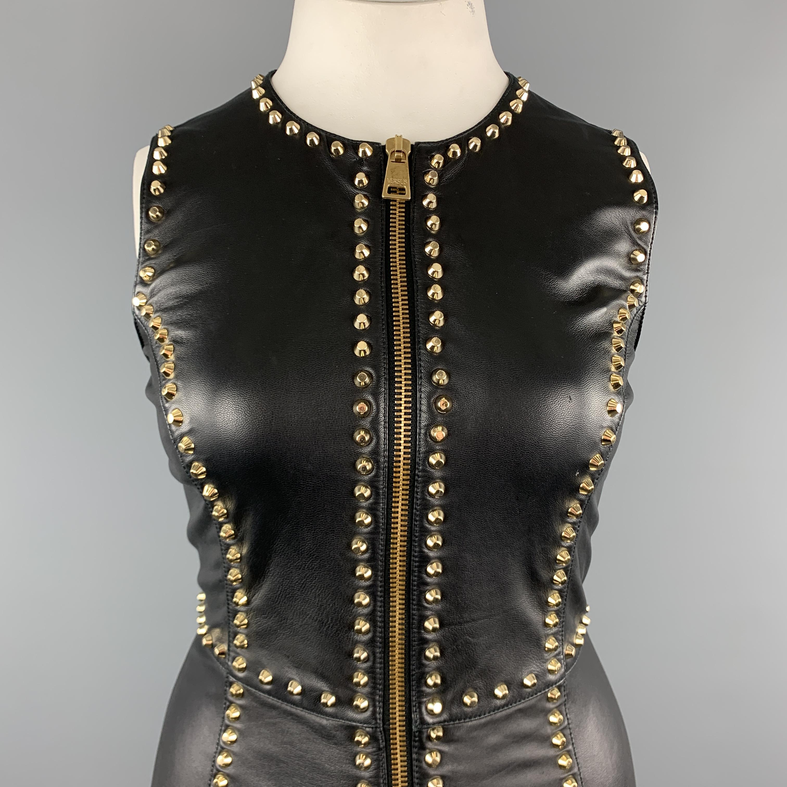 VERSUS by GIANNI VERSACE sleeveless sheath dress comes in smooth black leather with gold tone studded trim throughout and zip up front. 

Excellent Pre-Owned Condition.
Marked: (no size)

Measurements:

Shoulder: 13 in.
Bust: 36 in.
Waist: 30