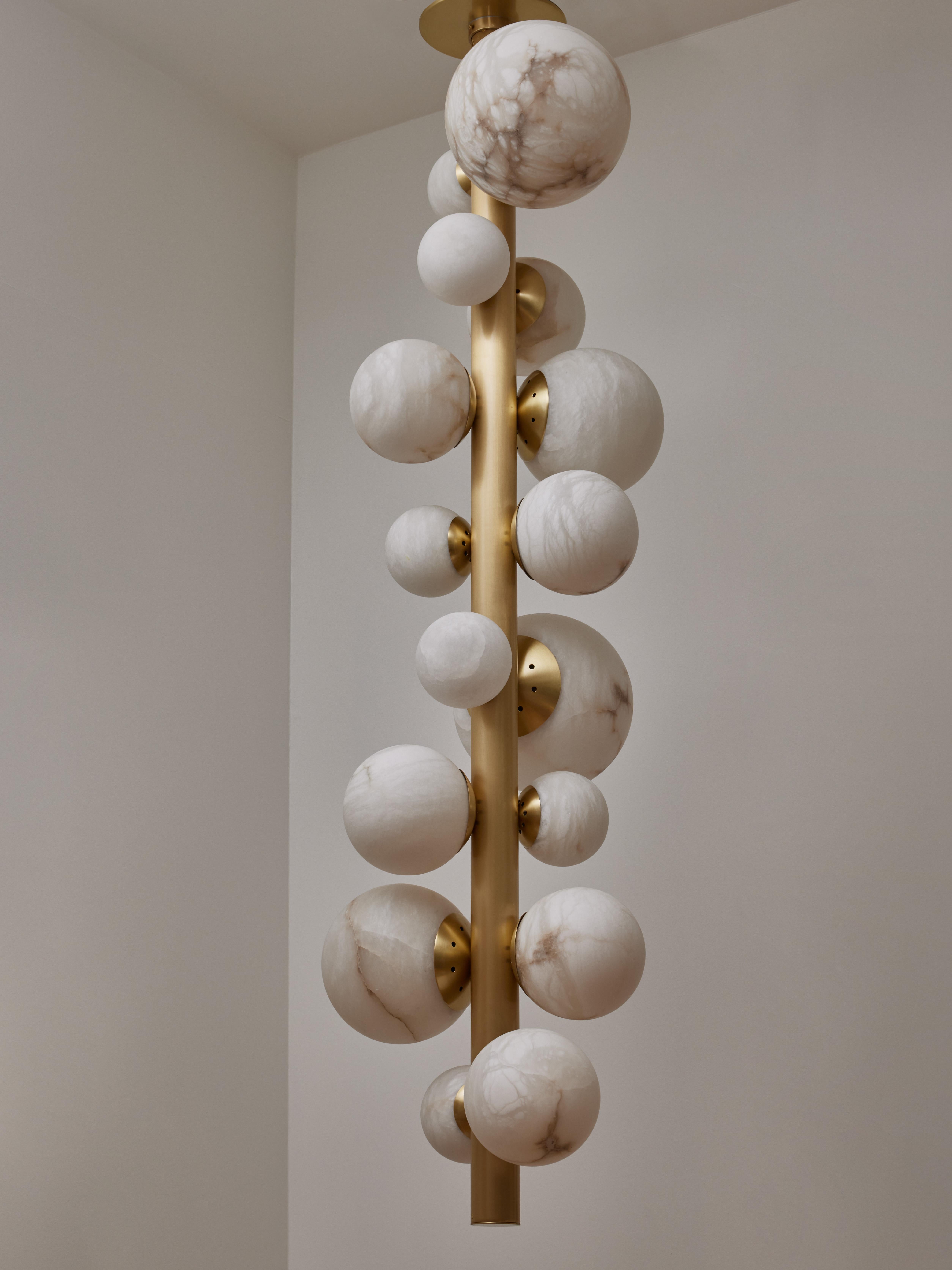 Modern Vertical Brass Chandelier with Alabaster Globes For Sale