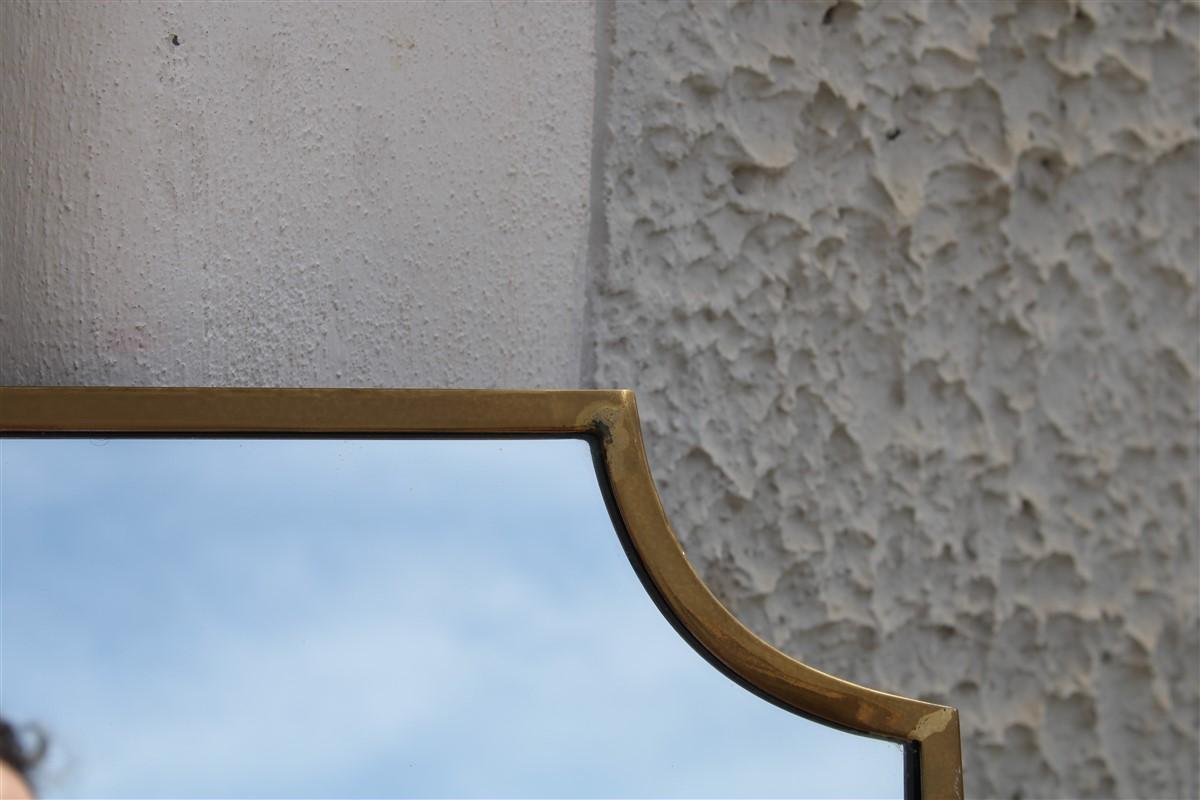 Vertical long Italian wall mirror in Mid-Century gold design brass, 1950s.