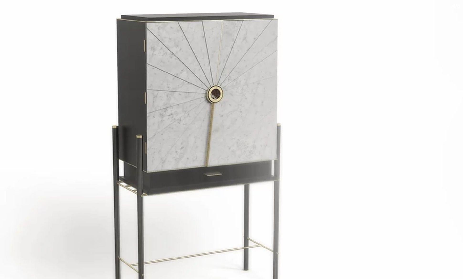 Vertigo cabinet by Marmi Serafini
Materials: Carrara C, Rosso Lepanto, Metal
Dimensions: 89 x 42 x 160 cm

Vertigo is a detail oriented cabinet. The marble covering on the doors of the cabinet is shaped in such a way to create an hypnotic effect