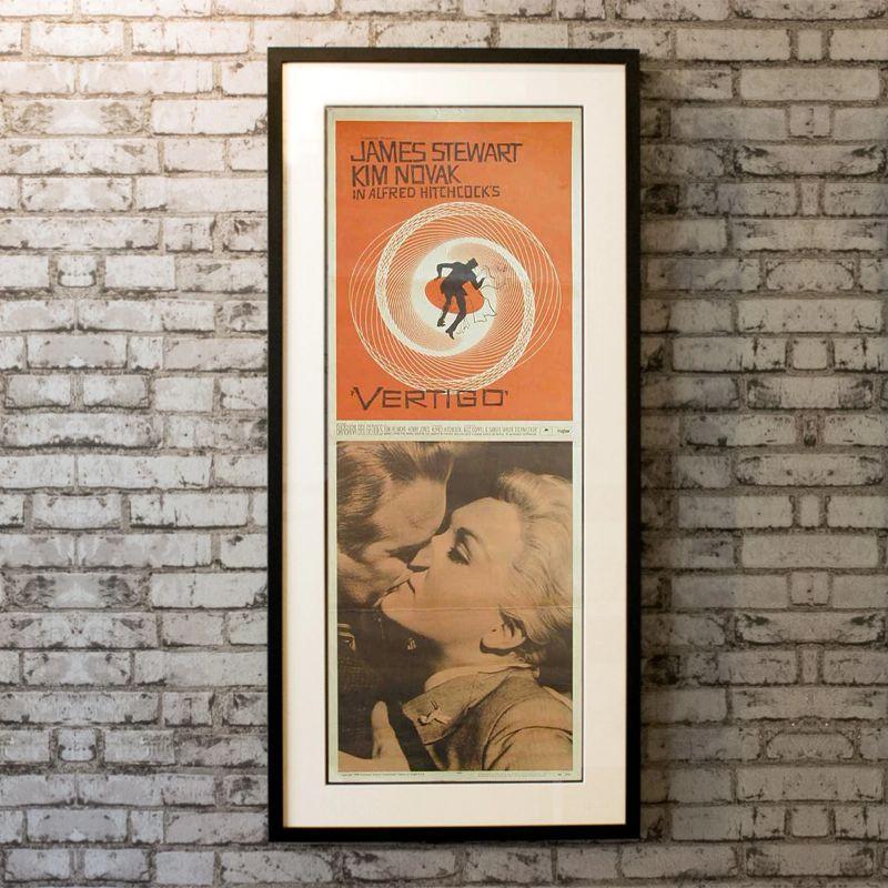 Vertigo, Unframed Posters, 1958

US INSERT (14 X 36 Inches). Collectors get the best of both worlds with this insert, as it includes both the iconic Saul Bass artwork and a passionate portrait of stars James Stewart and Kim Novak. Stewart's
