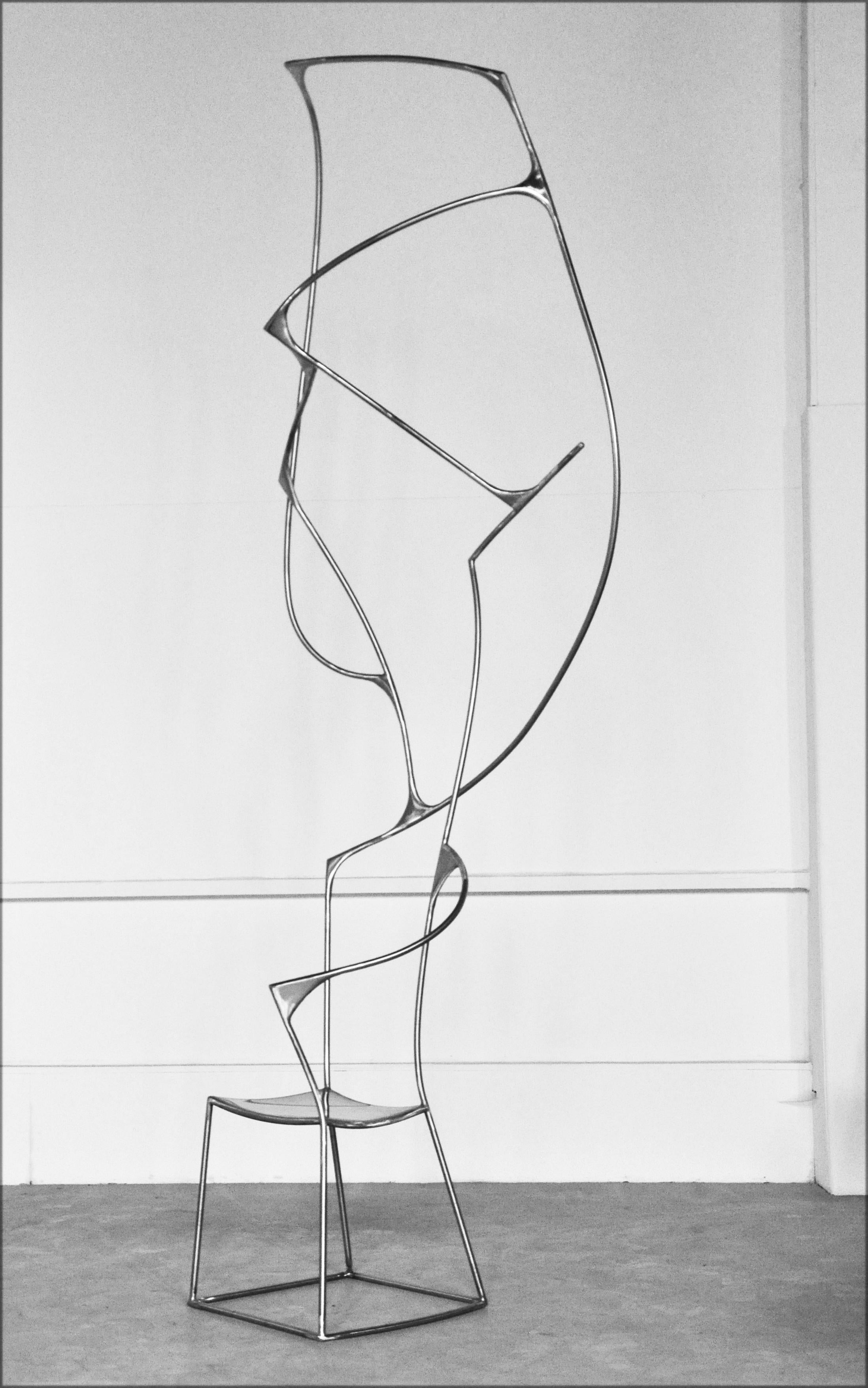 Vertigo V Sculptural Chair by Pol Quadens 
Unique Piece.
Dimensions: D 60 x W 120 x H 400 cm.
Materials: Polished stainless steel.

Pol Quadens was born in Brussels. His father was active in the fields of composites the metal industry, and the world