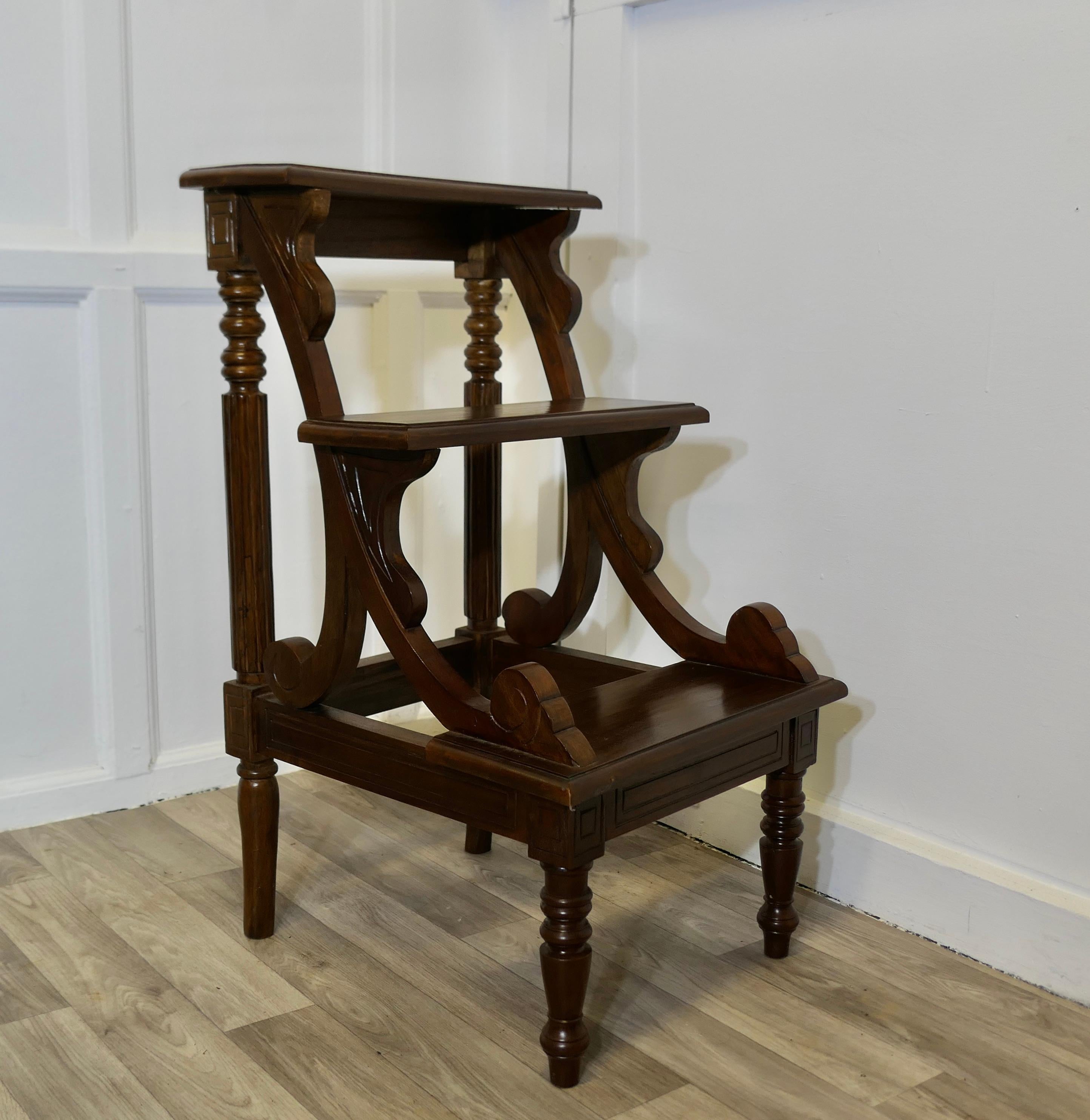 Very Attractive Edwardian Style Library Steps
 
This is a sturdy solid piece there are 2  steps and a top platform, the ladder would make a superb useful and decorative piece anywhere where extra height is needed 
The Steps have turned legs at the
