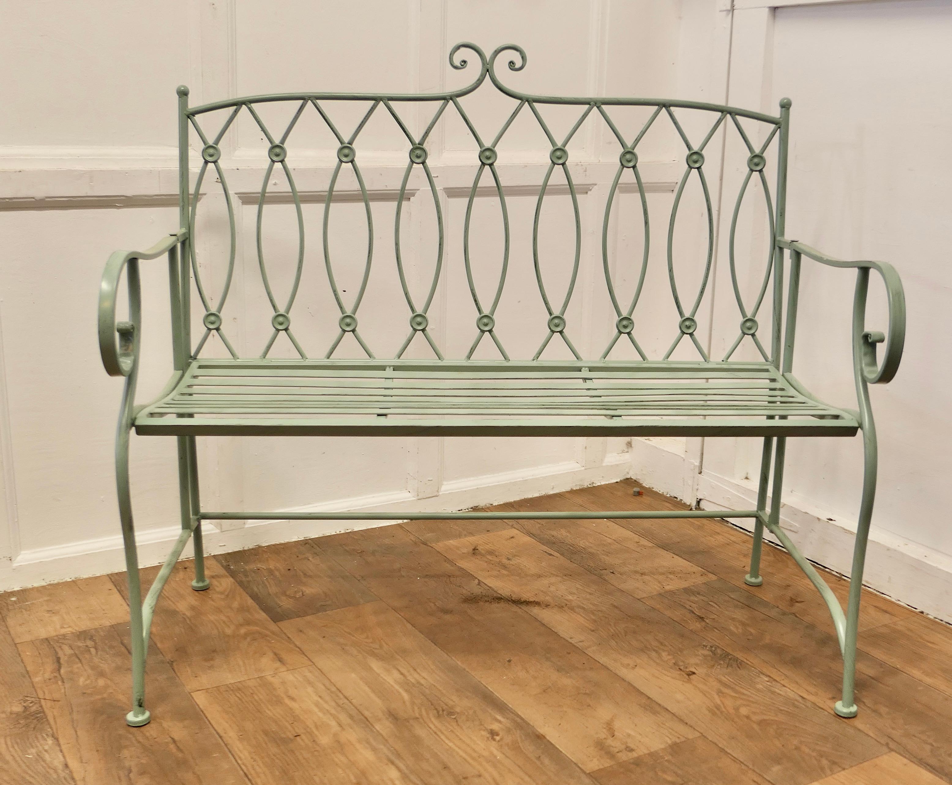 Very Attractive French Folding Green Metal Garden Bench  

A Lovely piece, it has seen very little use and is not outdoor weathered, the bench seats 2 comfortably, it can be very easily folded away, very useful for a balcony or other small space
The