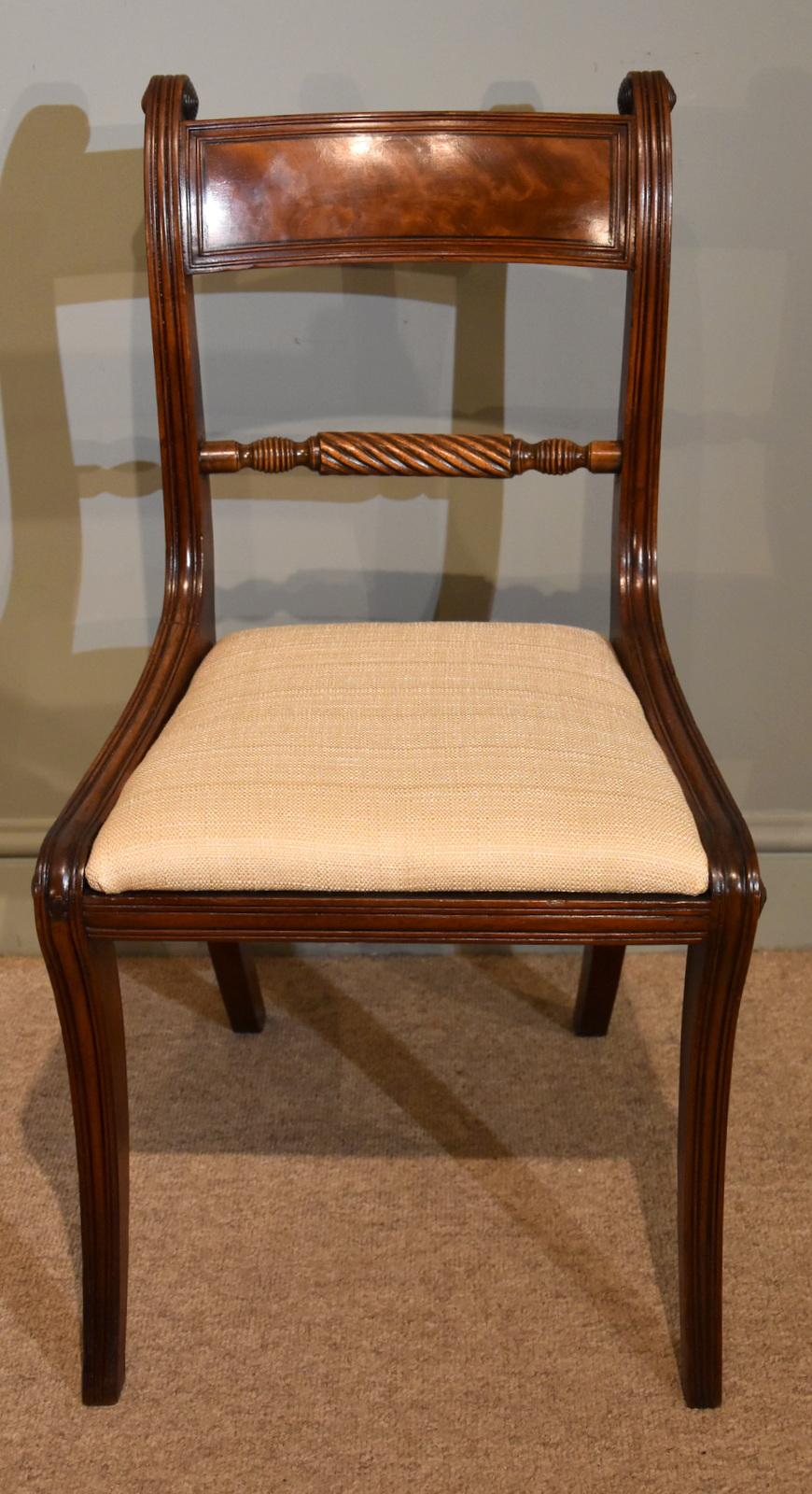 A very attractive set of ten harlequin Regency period mahogany rope back dining chairs, very similar

Dimensions single chair
Height 33.5