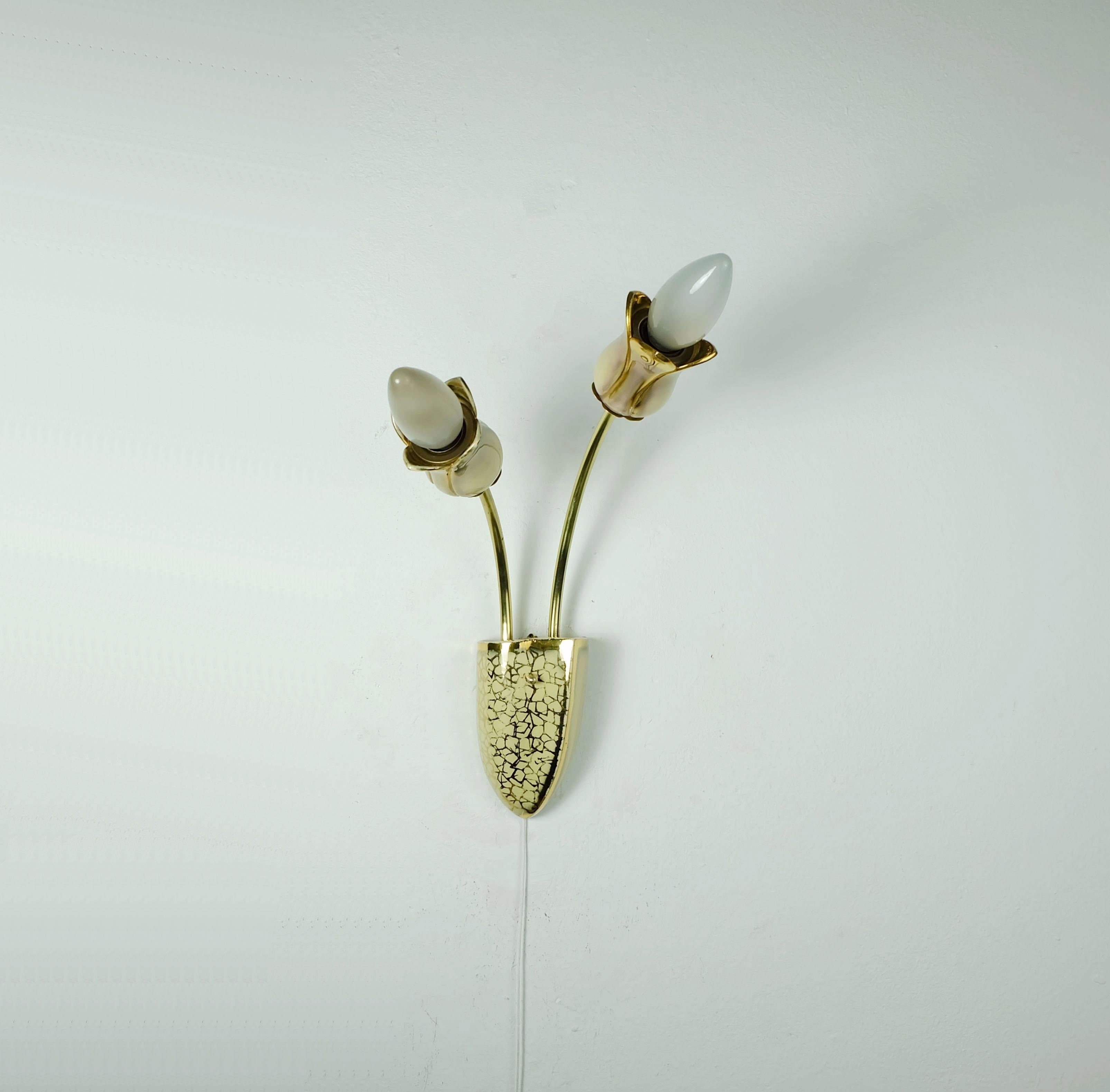 A very beautiful and rare 2-light mid century sconce. Made of beige, yellow and gold glazed ceramic and brass. Holds 2 E14 bulbs (no bulbs included in the price).

Height 12 1/2