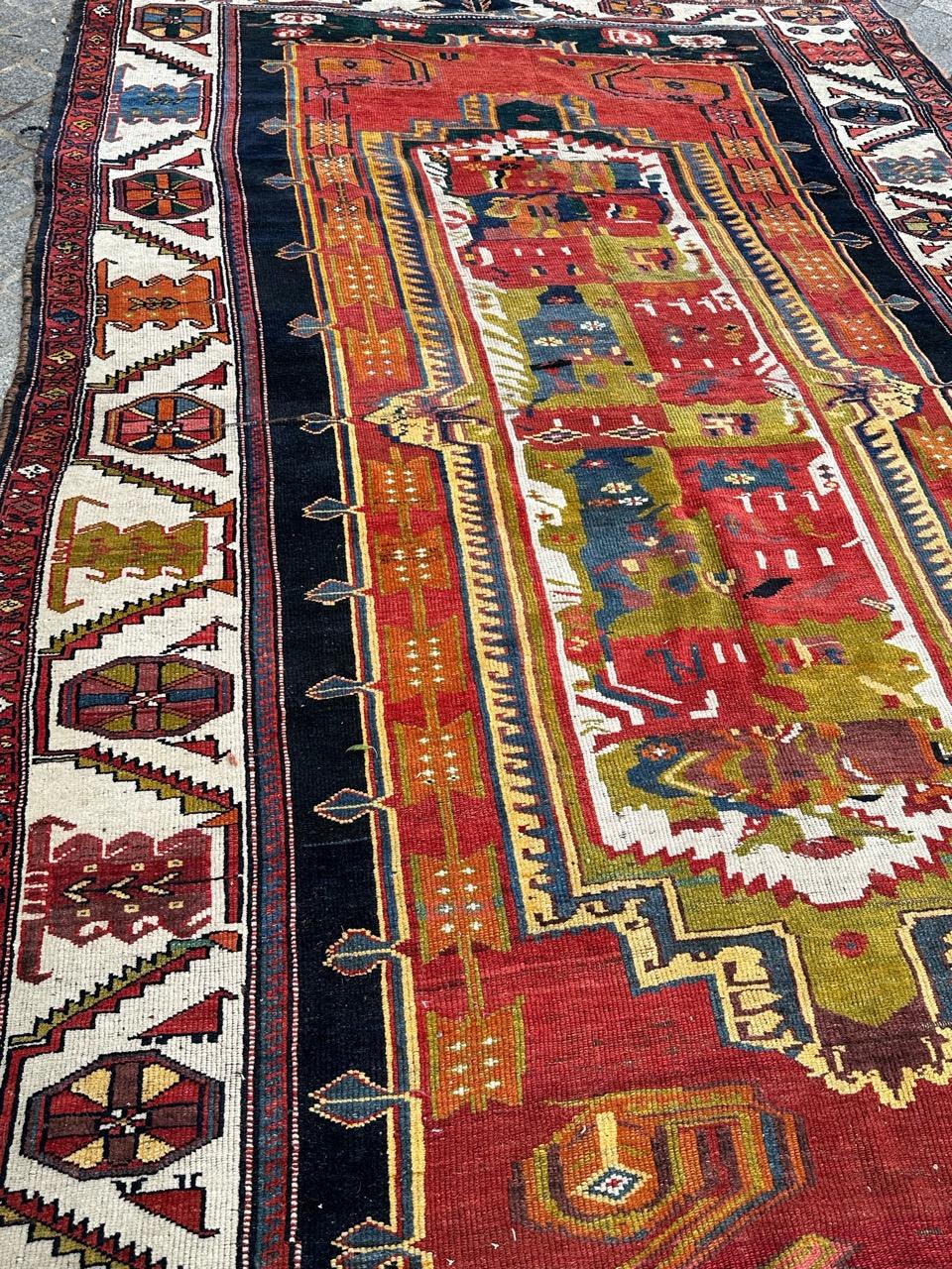 Preciosa alfombra kurda antigua de colores en venta 9