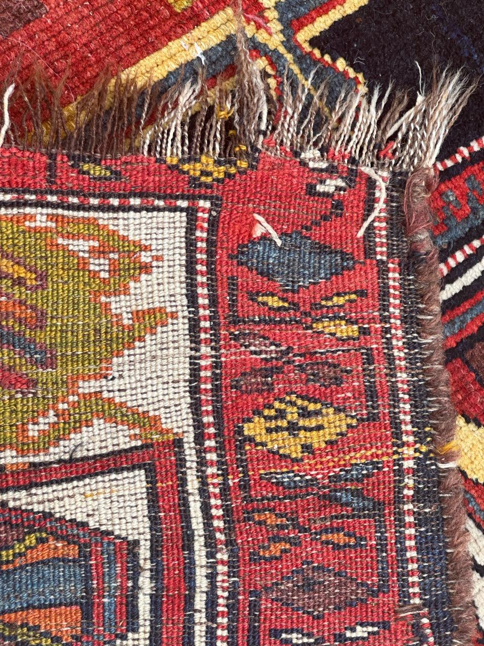Preciosa alfombra kurda antigua de colores en venta 11