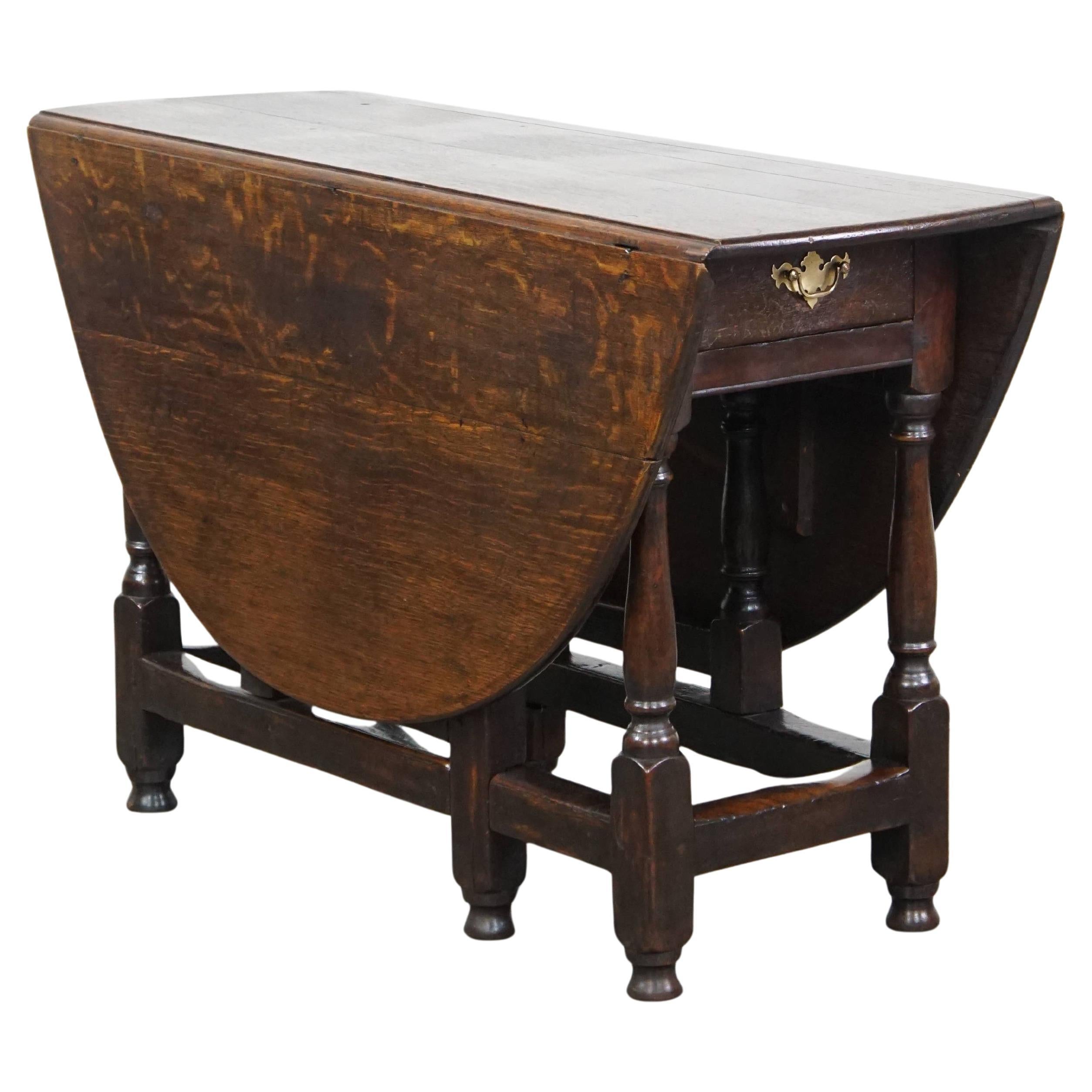 Very beautiful antique English oak gateleg table with an excellent patina For Sale