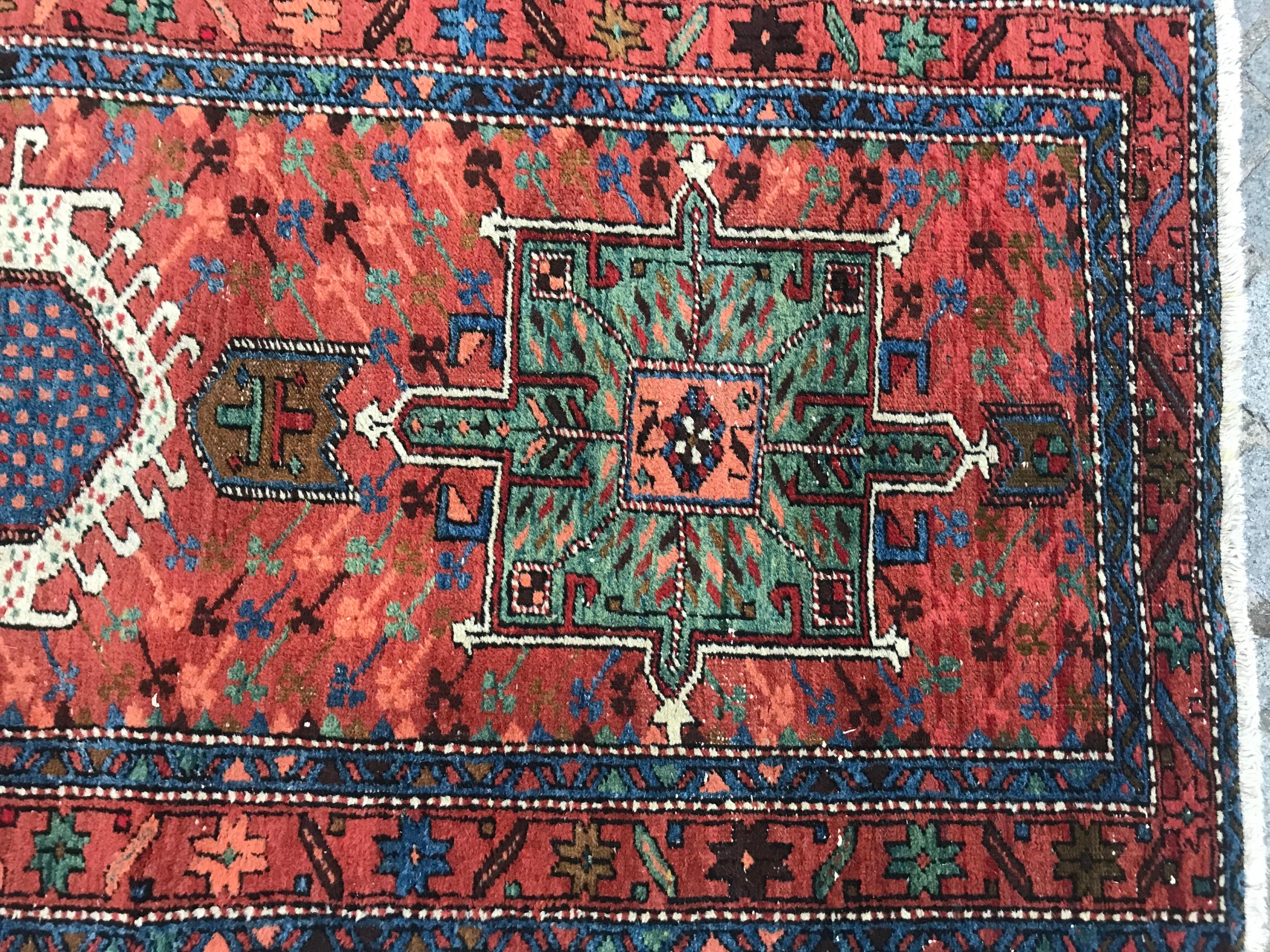 Beautiful late 19th century runner with geometrical design of Heriz and natural colors with red, orange, green and blue, entirely hand knotted with wool velvet on cotton foundation.