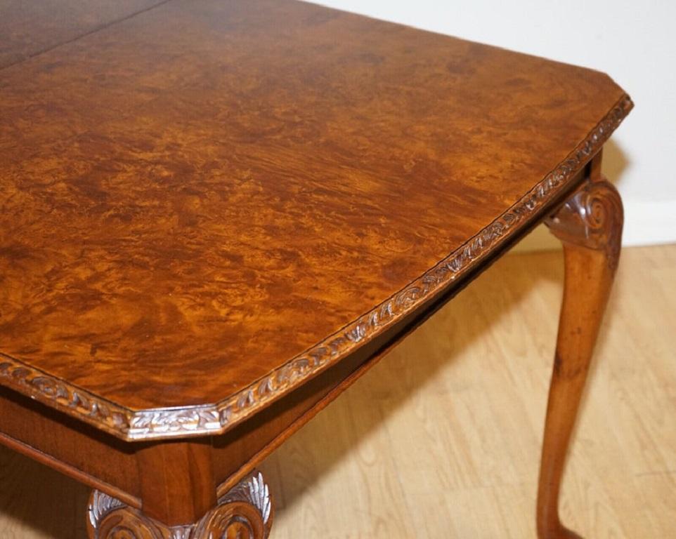 British Very Beautiful Burr Walnut Queen Anne Carved Legs Dining Table, circa 1930s For Sale