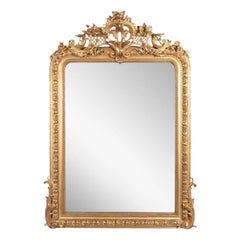 Very Beautiful French Regence-style mirror in carved gilded wood