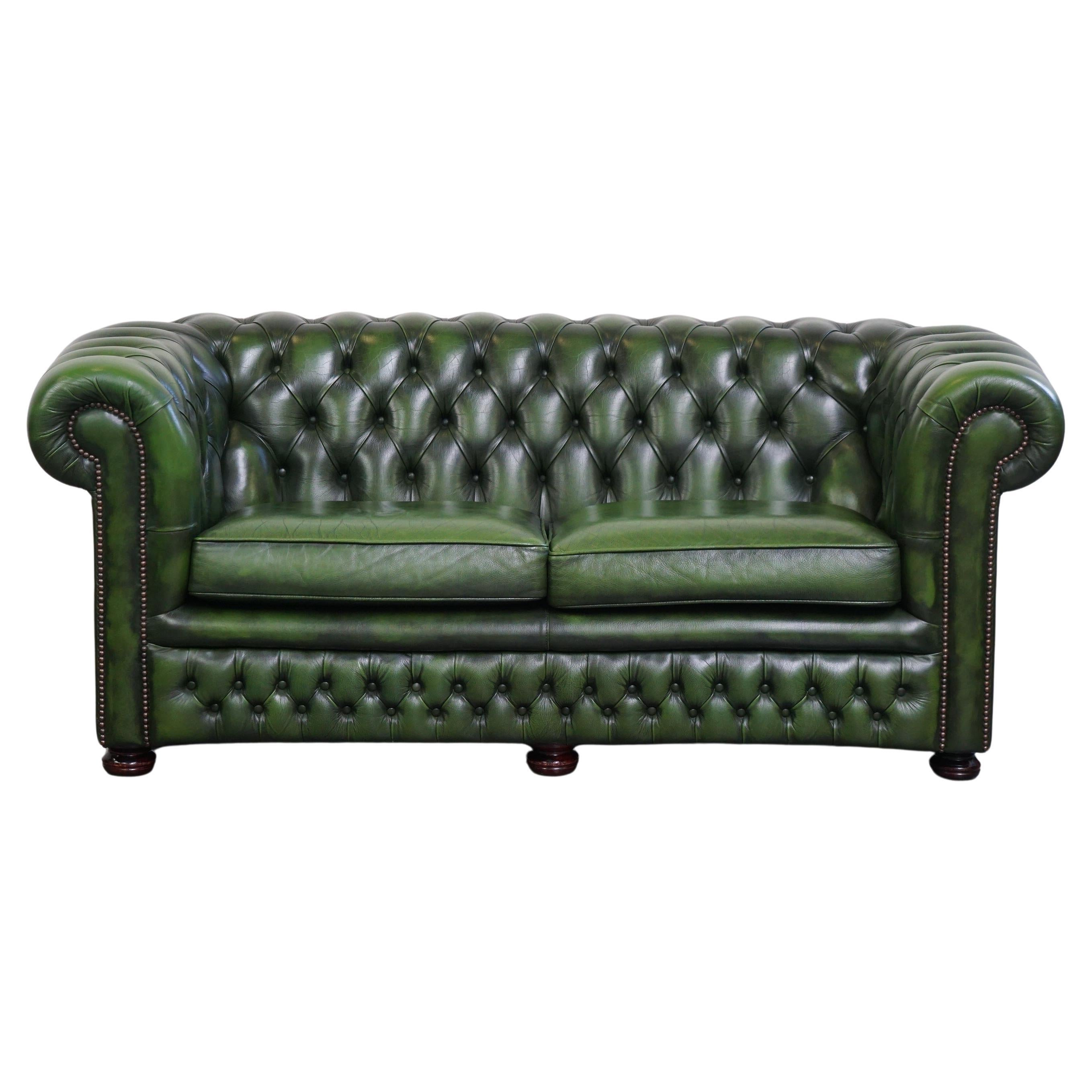 Very beautiful green leather English Springvale Chesterfield sofa, 2-seater