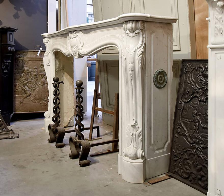 Very beautiful French hand carved fireplace to place in
front of the chimney.